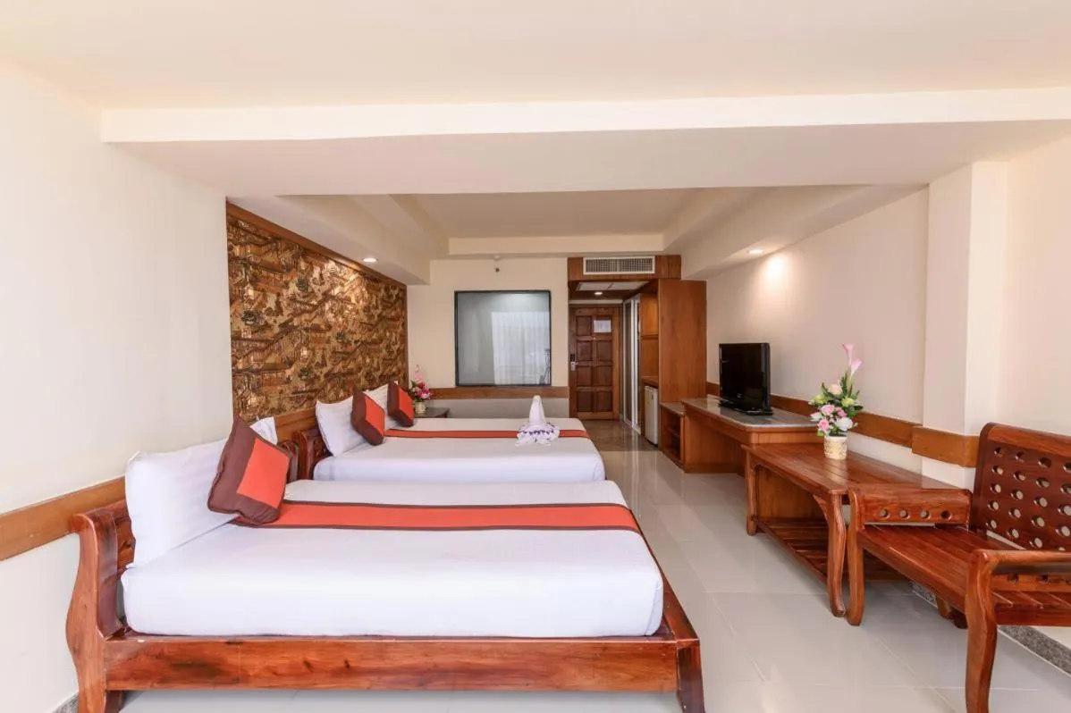 Bed in Boutique Paradise Hotel