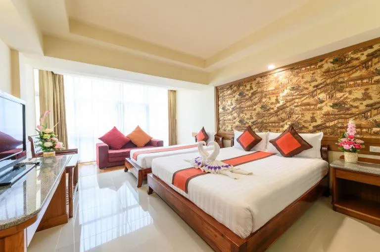 Bed in Boutique Paradise Hotel