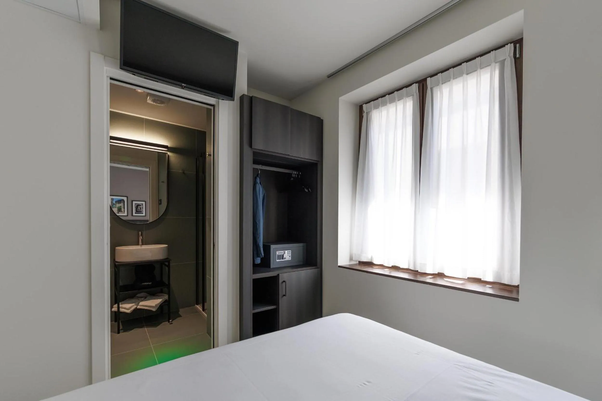 Bed in Hotel Stelvio Tirano