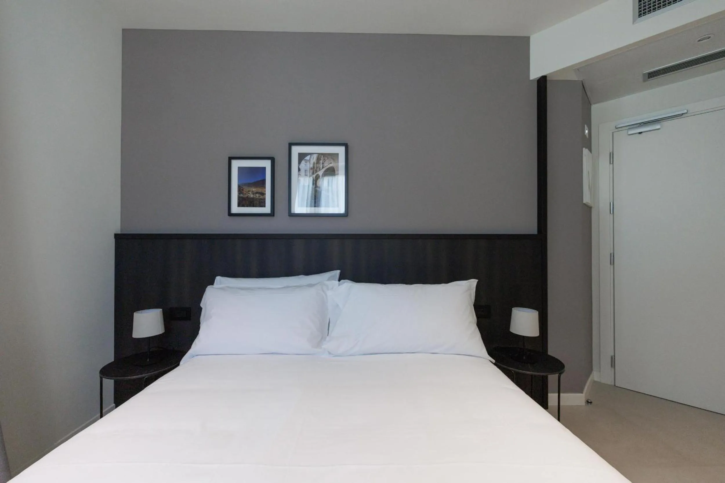 Bed in Hotel Stelvio Tirano