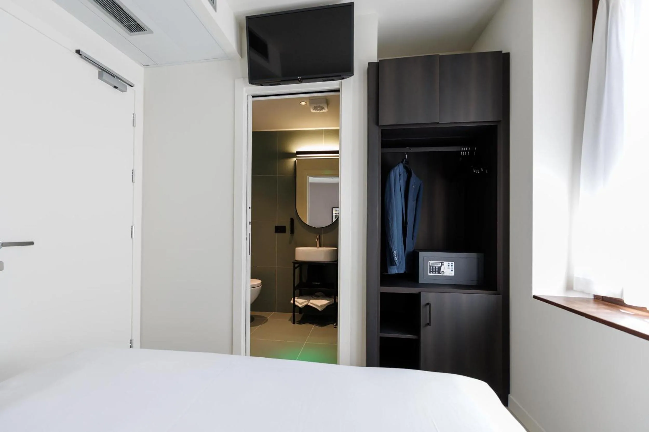 Bed in Hotel Stelvio Tirano
