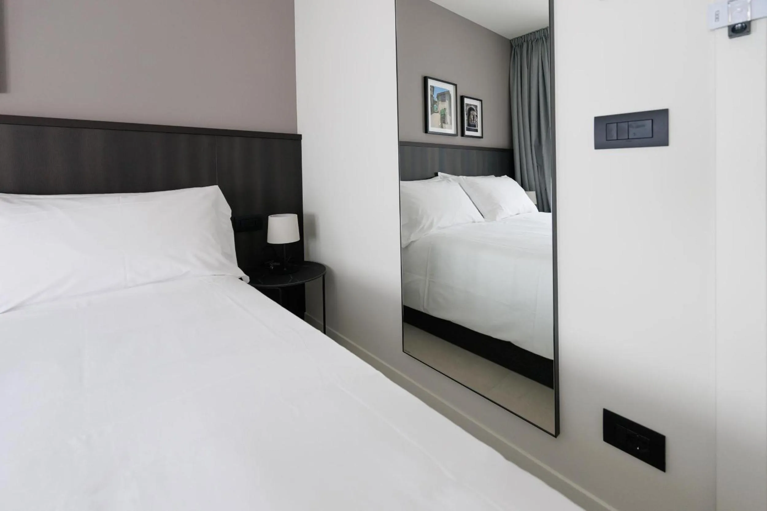 Bed in Hotel Stelvio Tirano