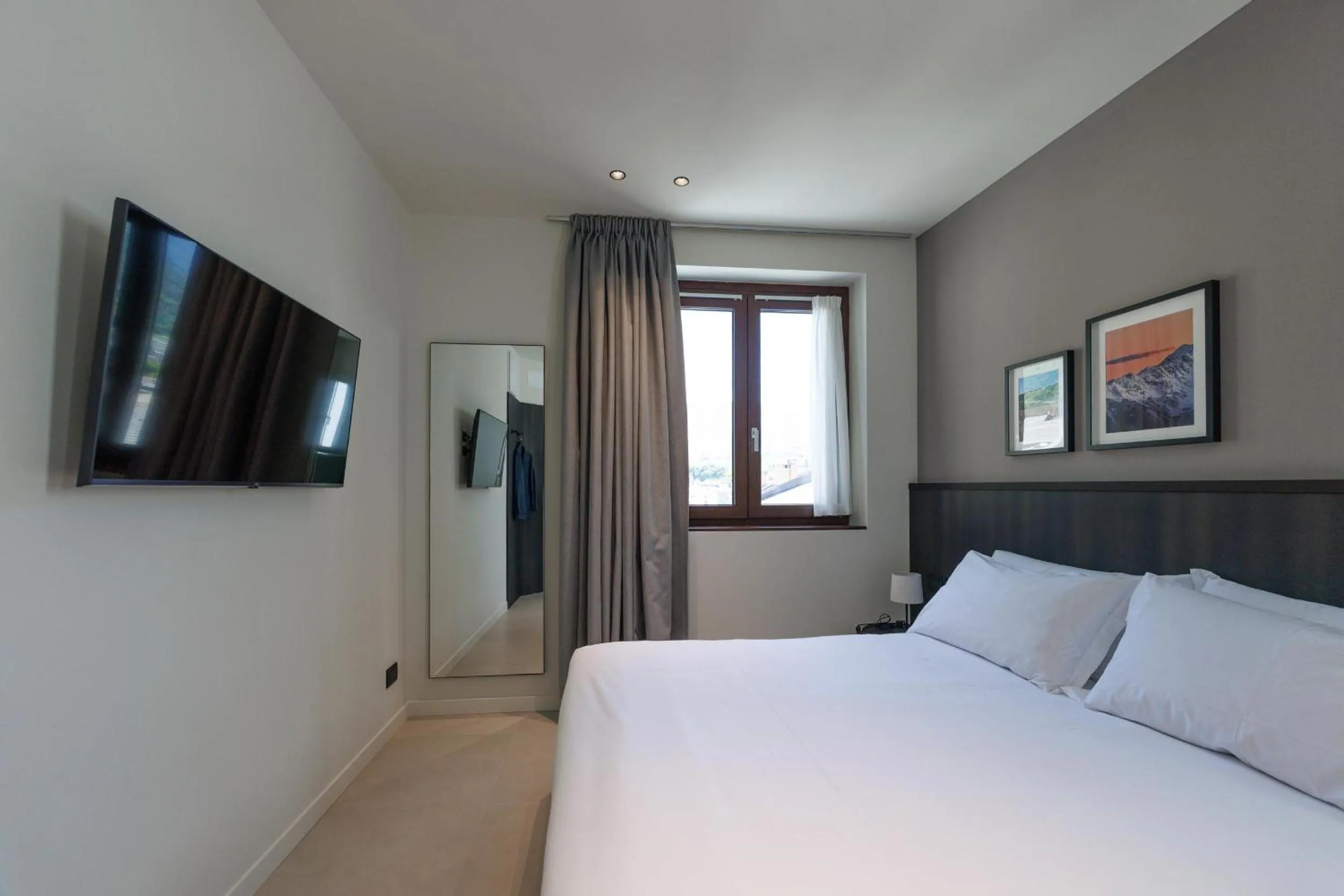 Bed in Hotel Stelvio Tirano