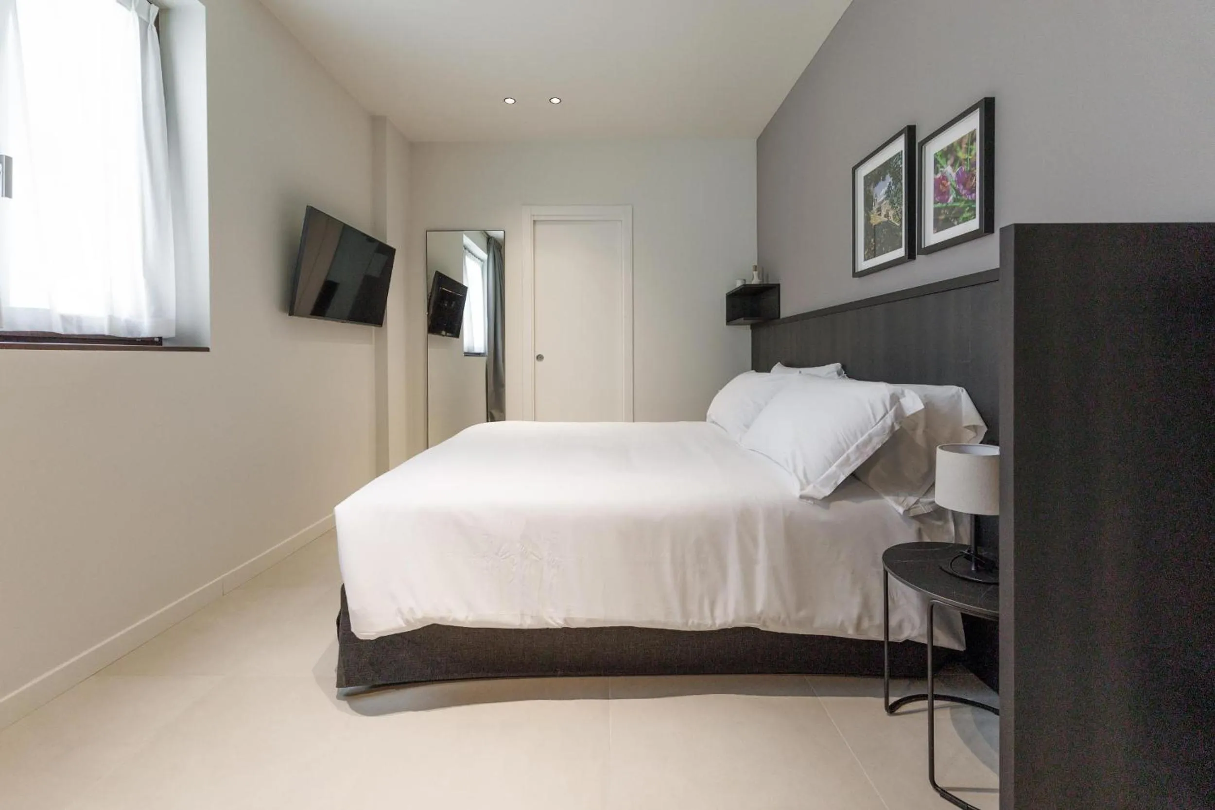 Bed in Hotel Stelvio Tirano