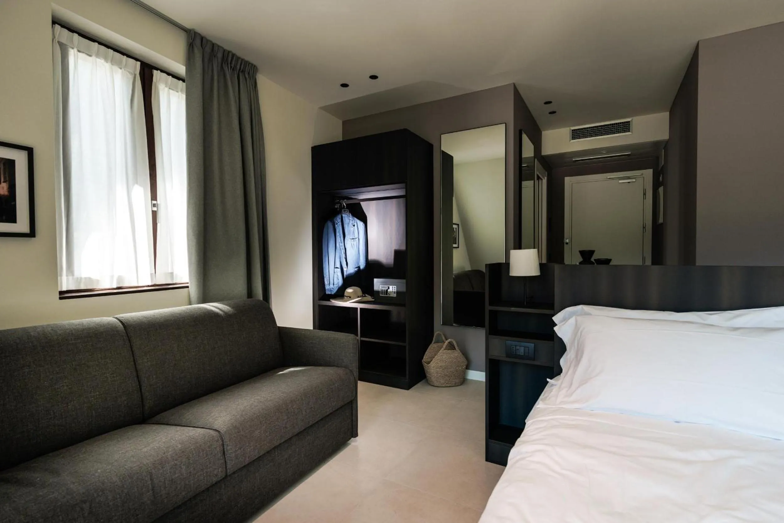 Bed in Hotel Stelvio Tirano