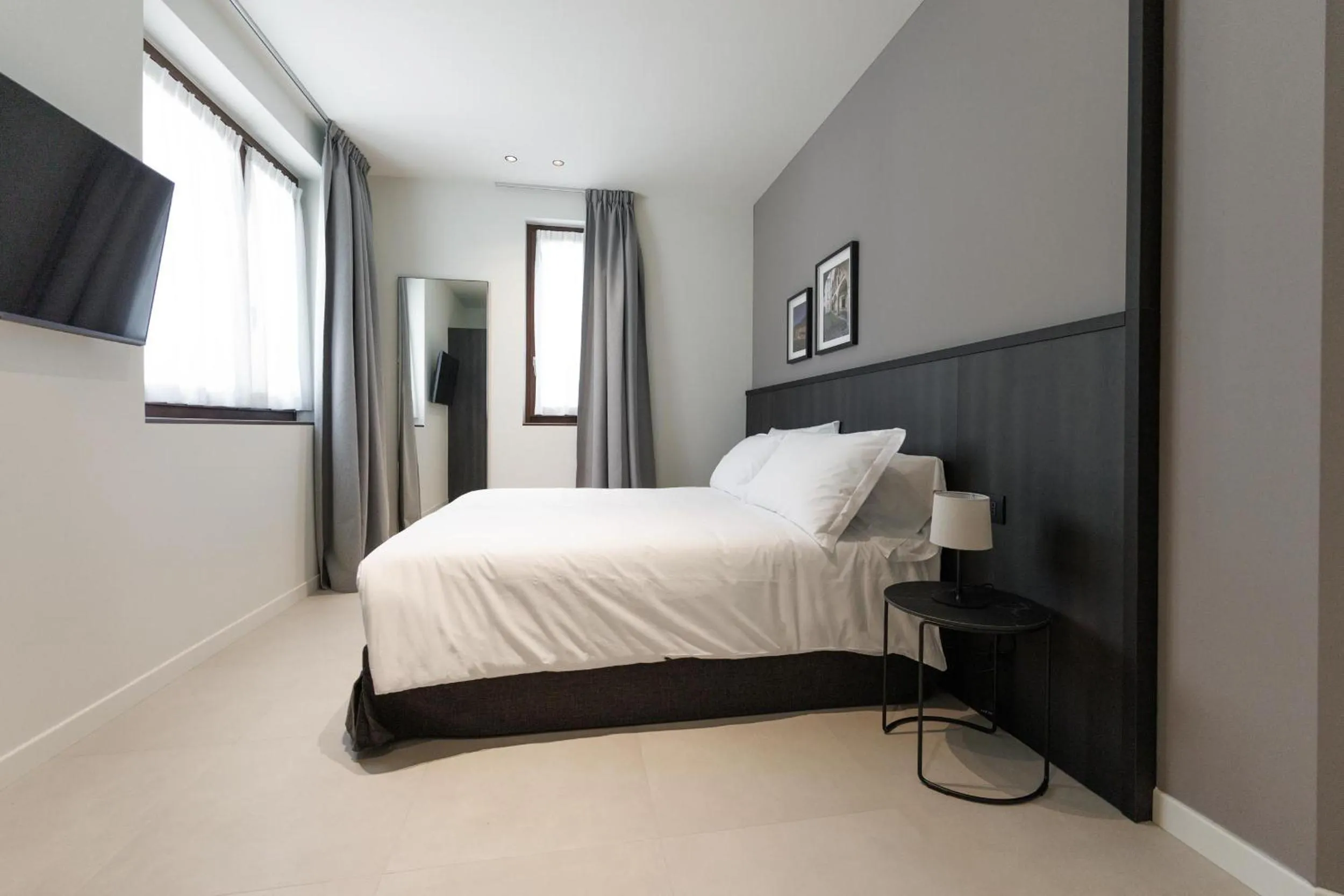 Bed in Hotel Stelvio Tirano