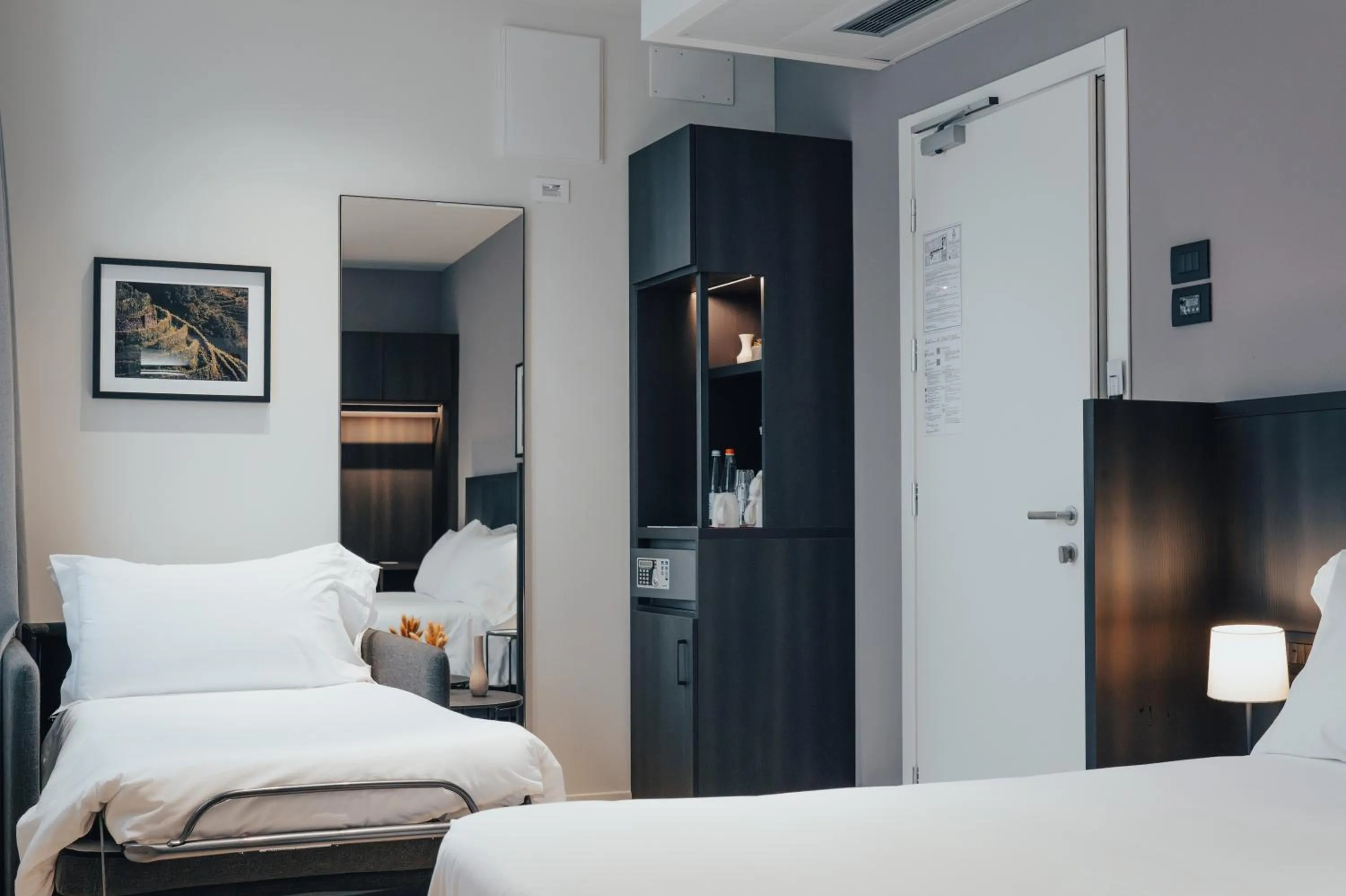 Bed in Hotel Stelvio Tirano