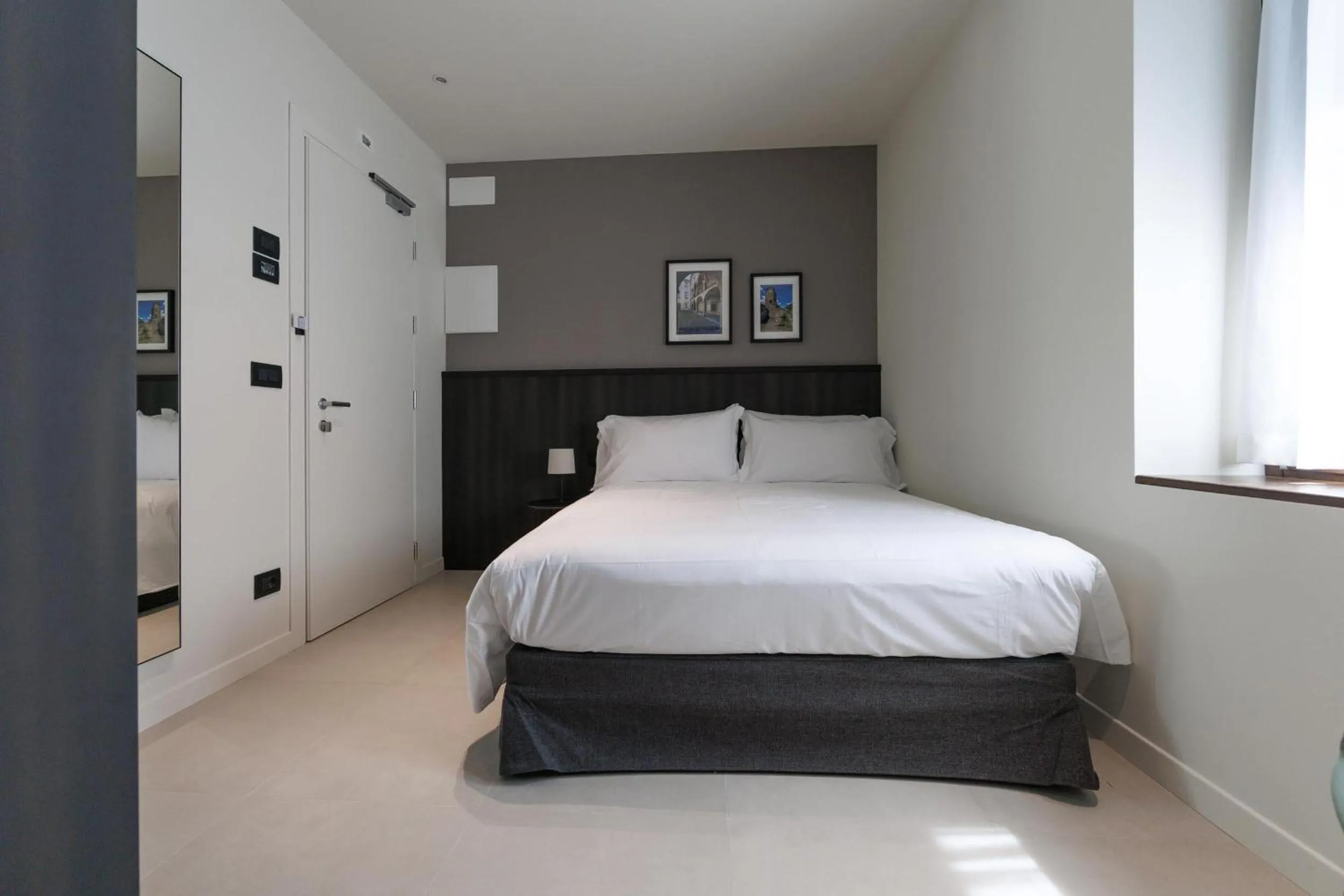 Bed in Hotel Stelvio Tirano