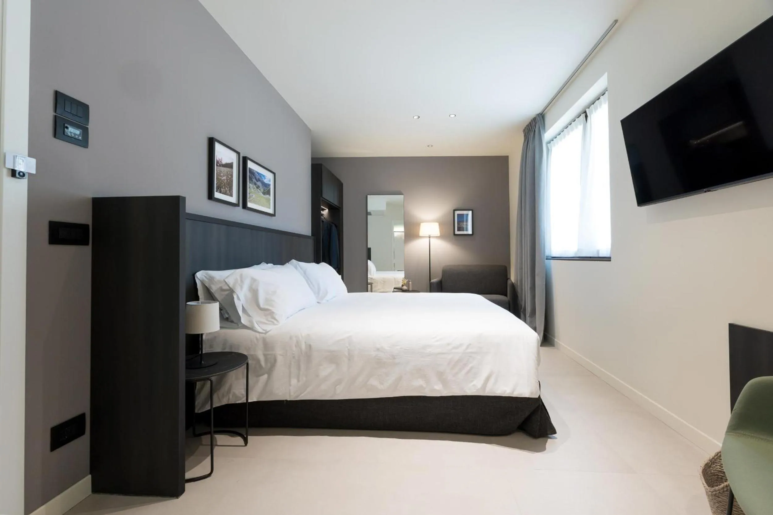 Bed in Hotel Stelvio Tirano
