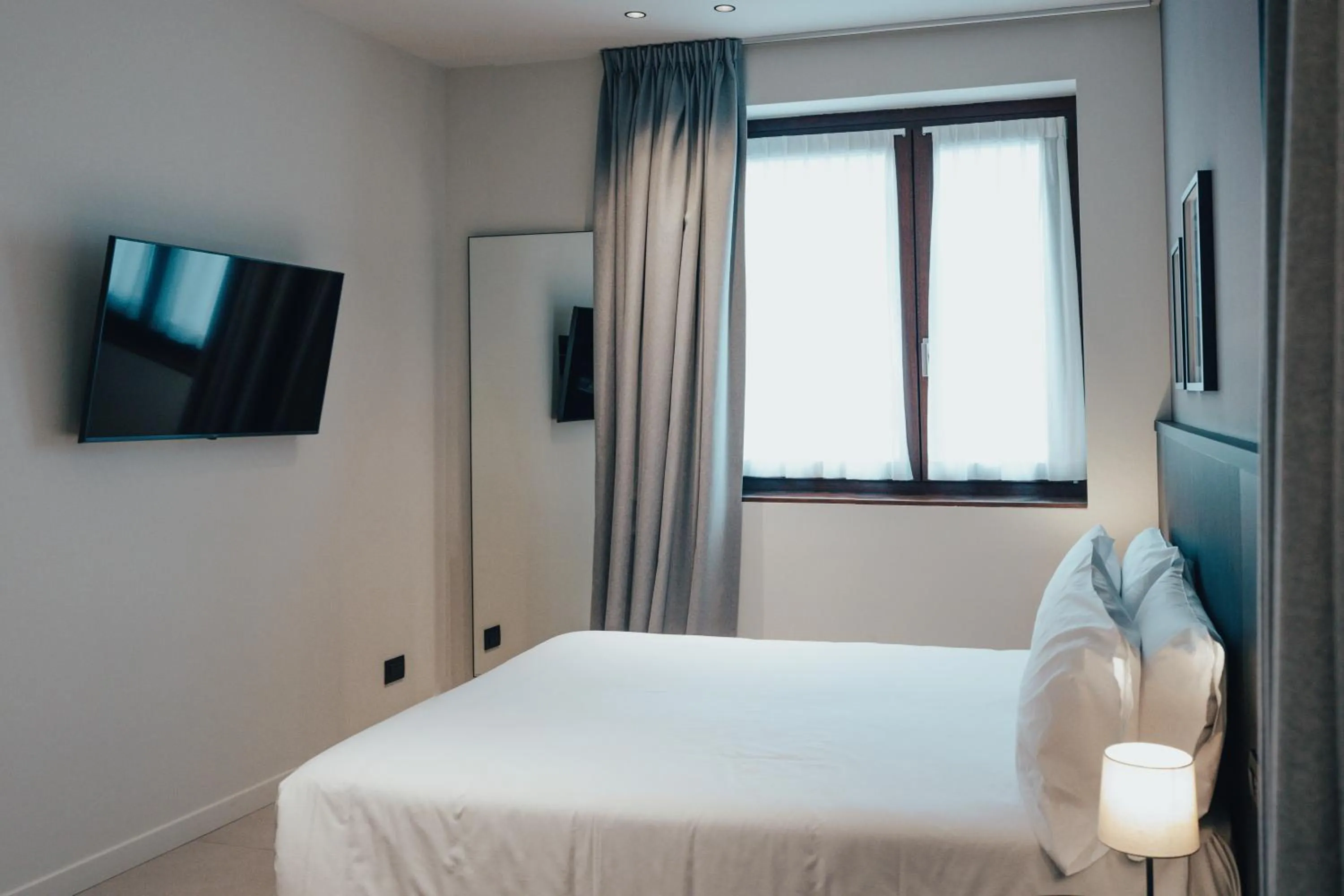 Bed in Hotel Stelvio Tirano