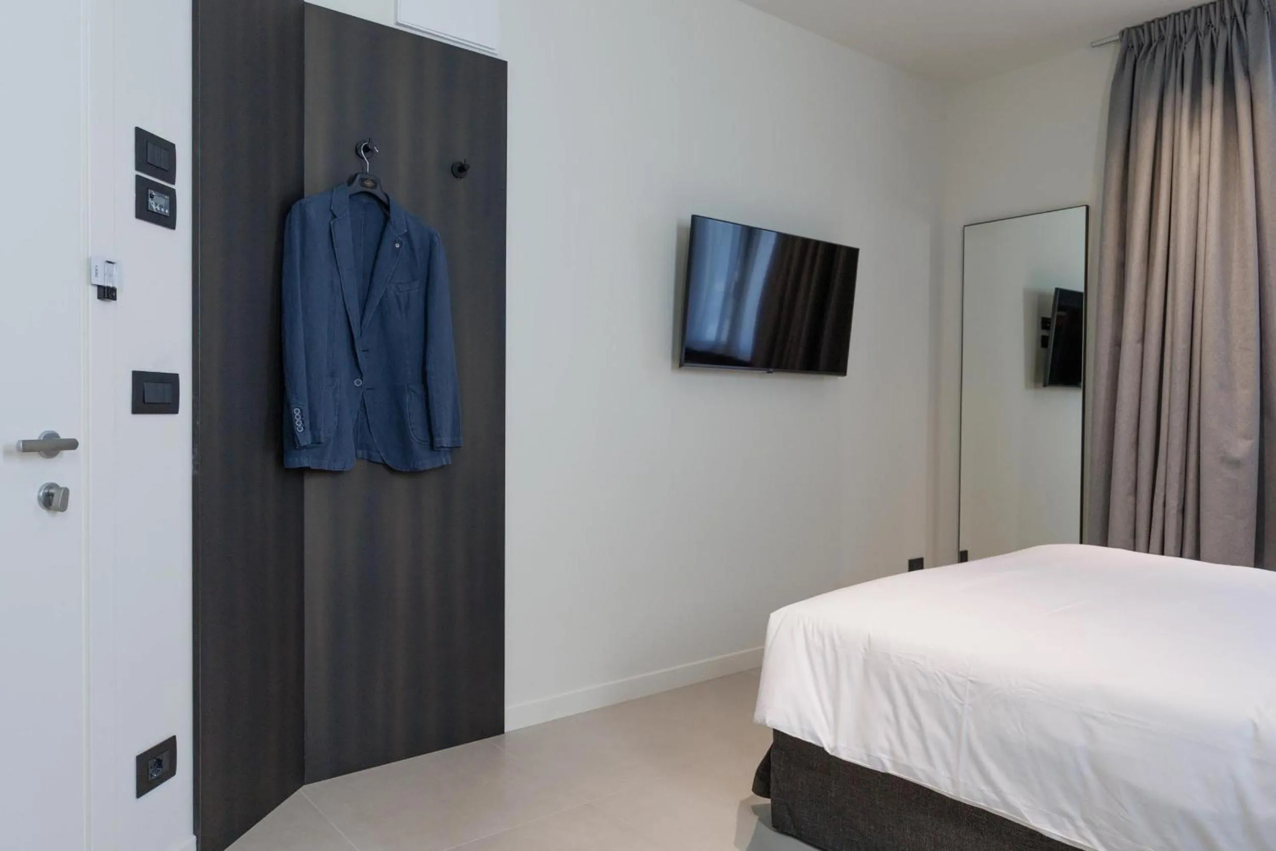Bed in Hotel Stelvio Tirano