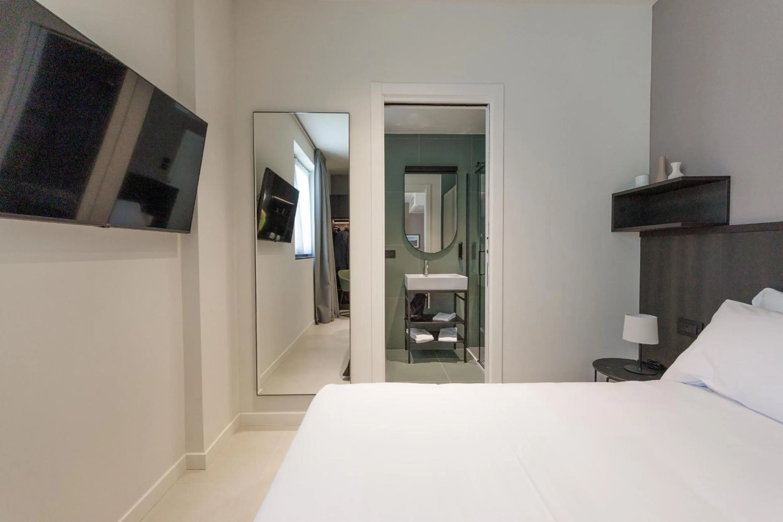 Bed in Hotel Stelvio Tirano