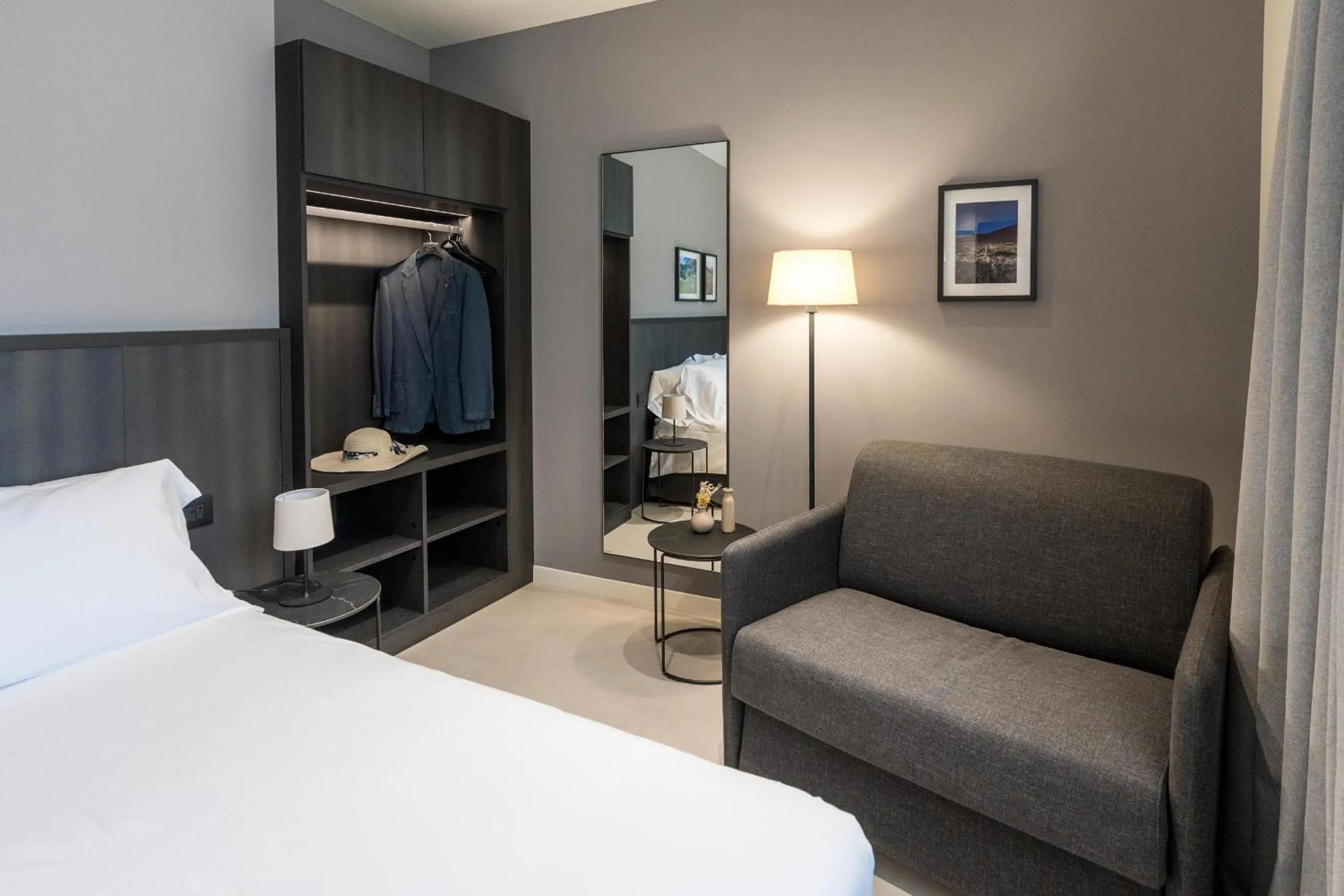 Bed in Hotel Stelvio Tirano