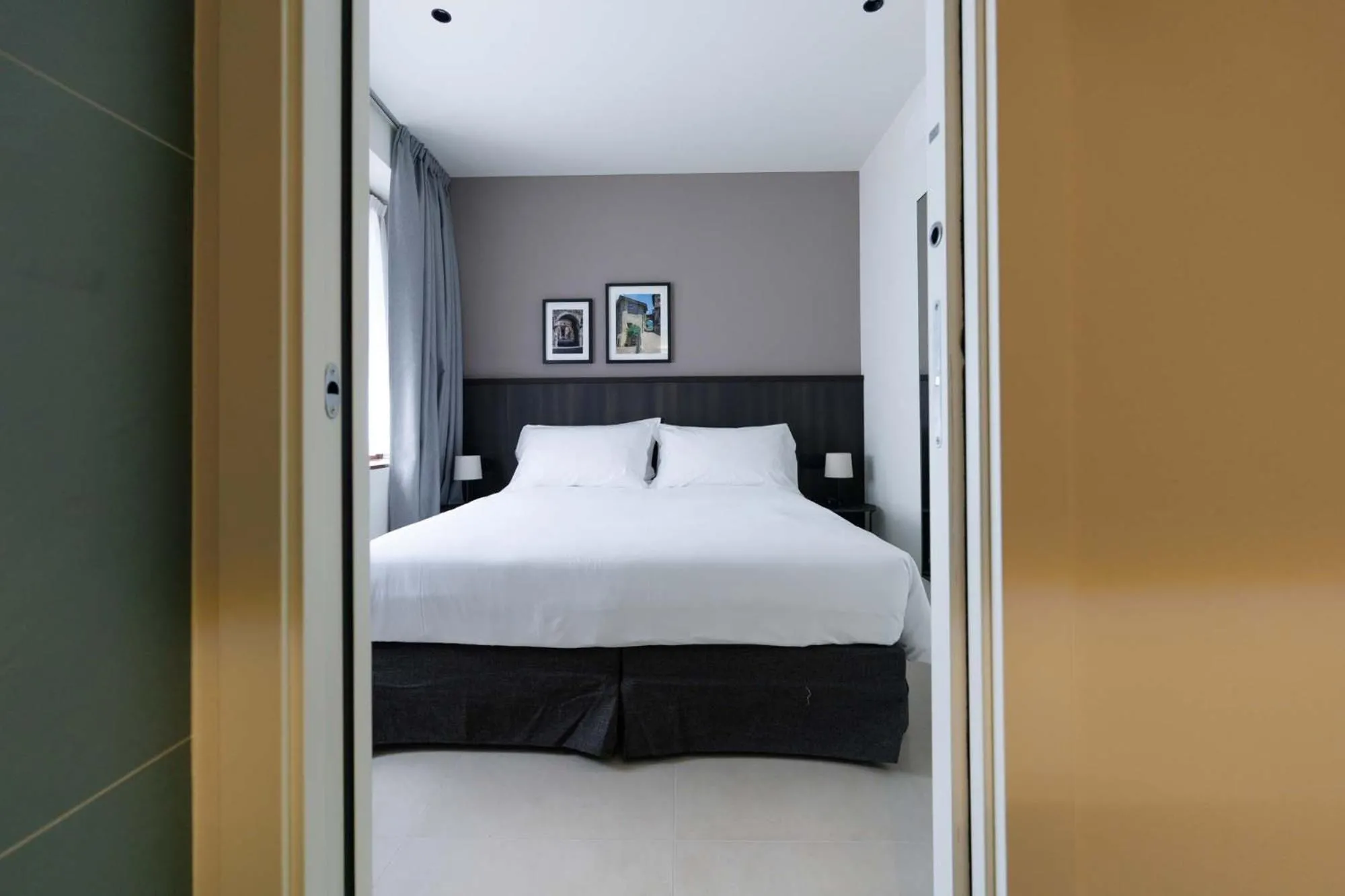 Bed in Hotel Stelvio Tirano