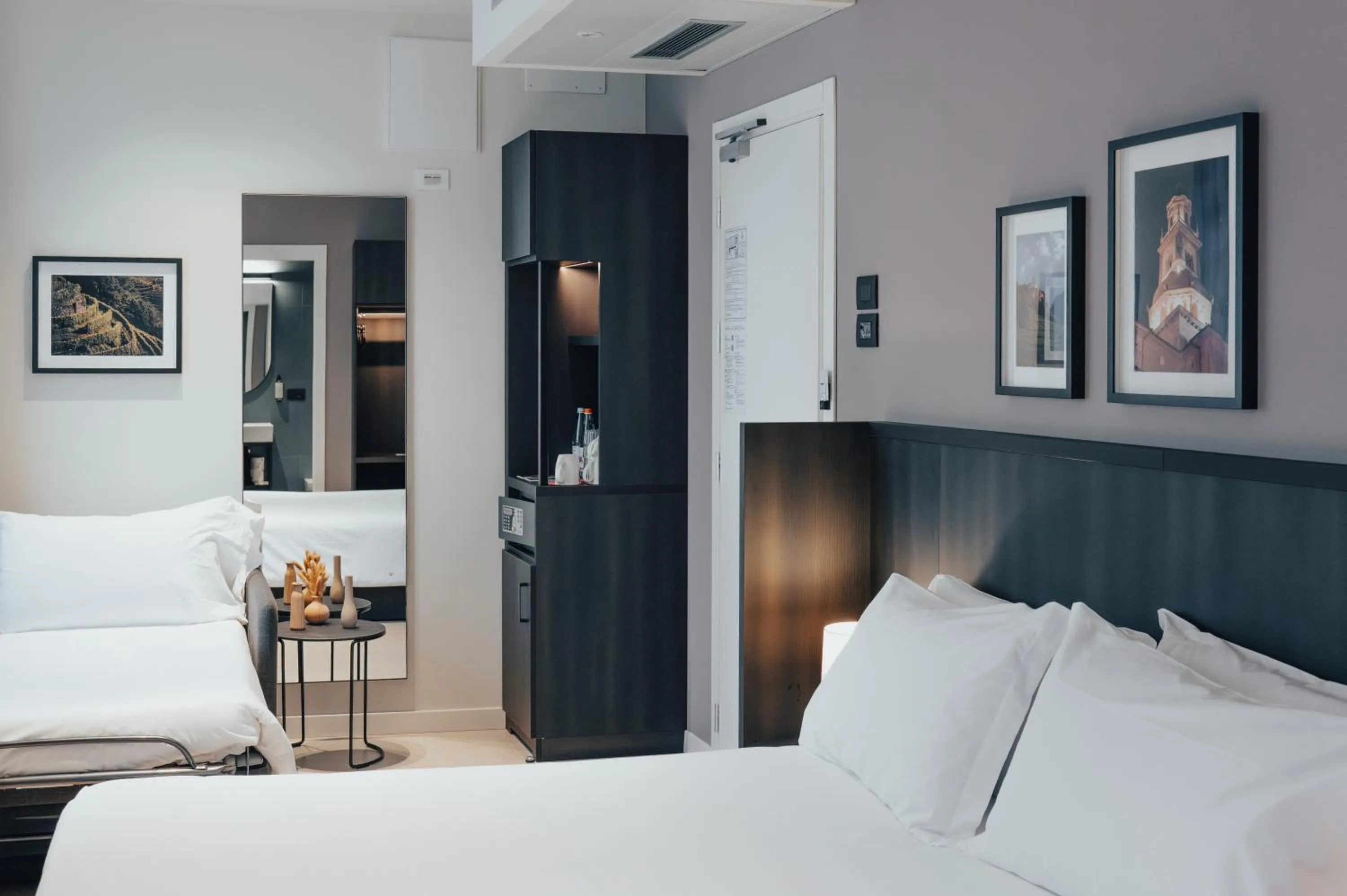Bed in Hotel Stelvio Tirano