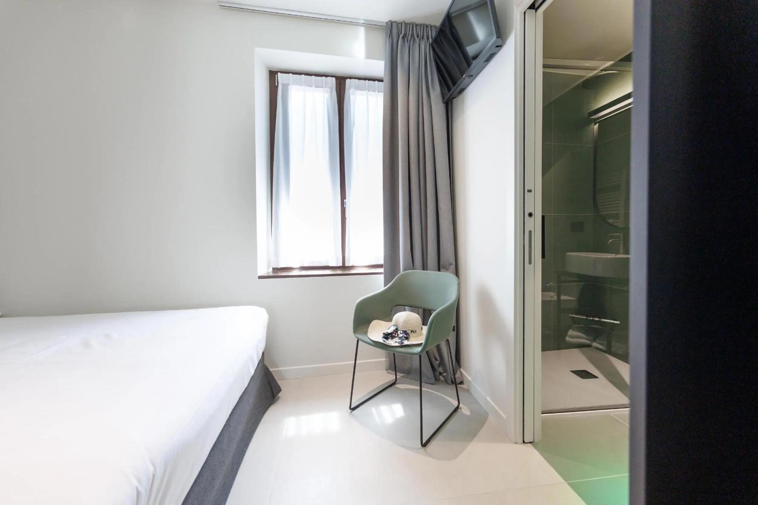 Bed in Hotel Stelvio Tirano