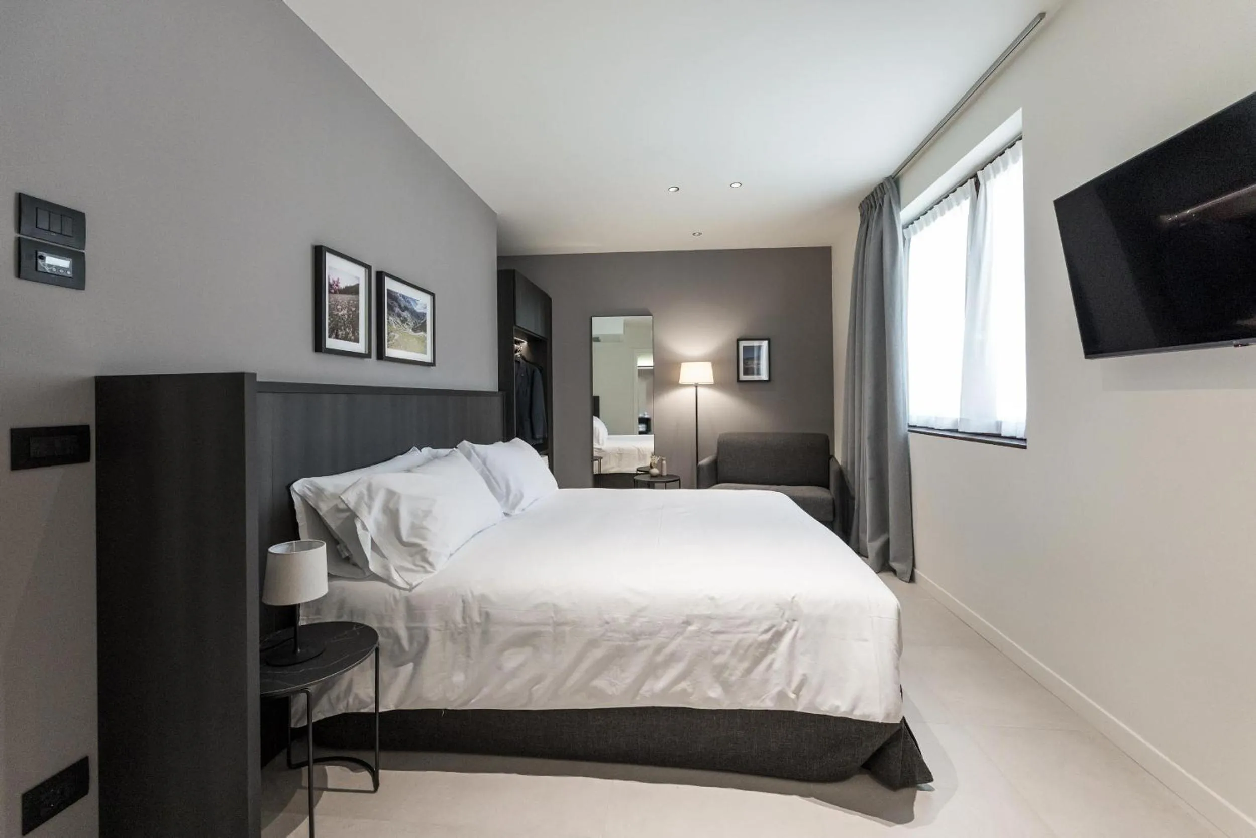 Bed in Hotel Stelvio Tirano