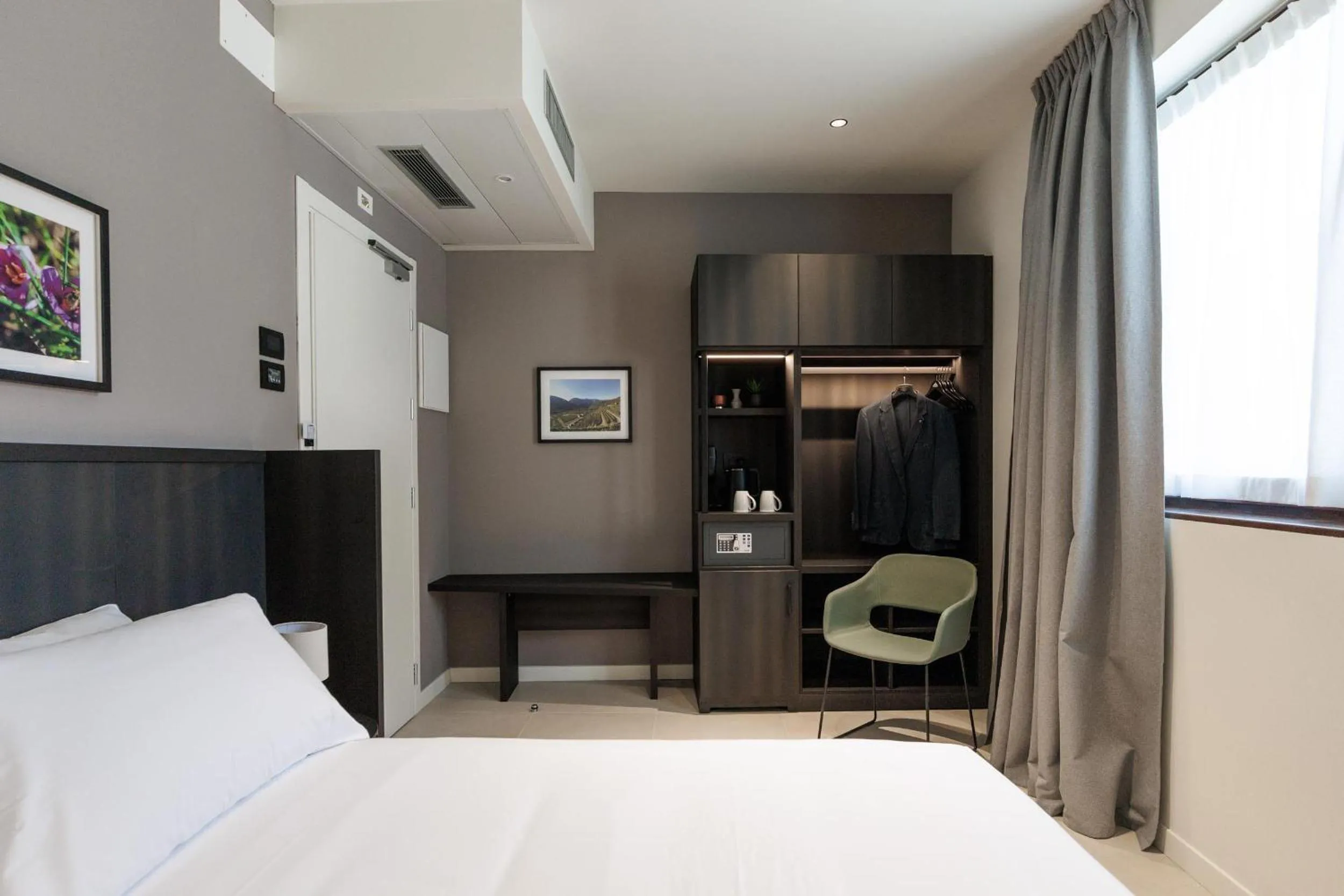 Bed in Hotel Stelvio Tirano
