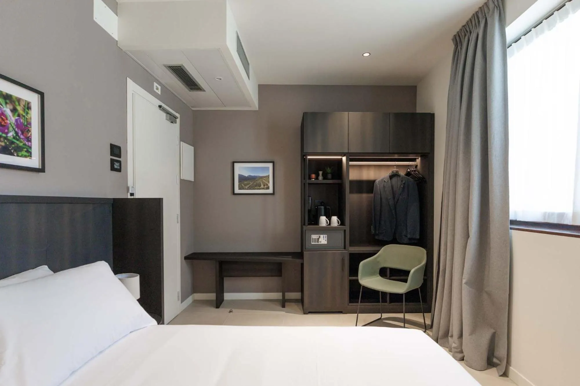 Bed in Hotel Stelvio Tirano