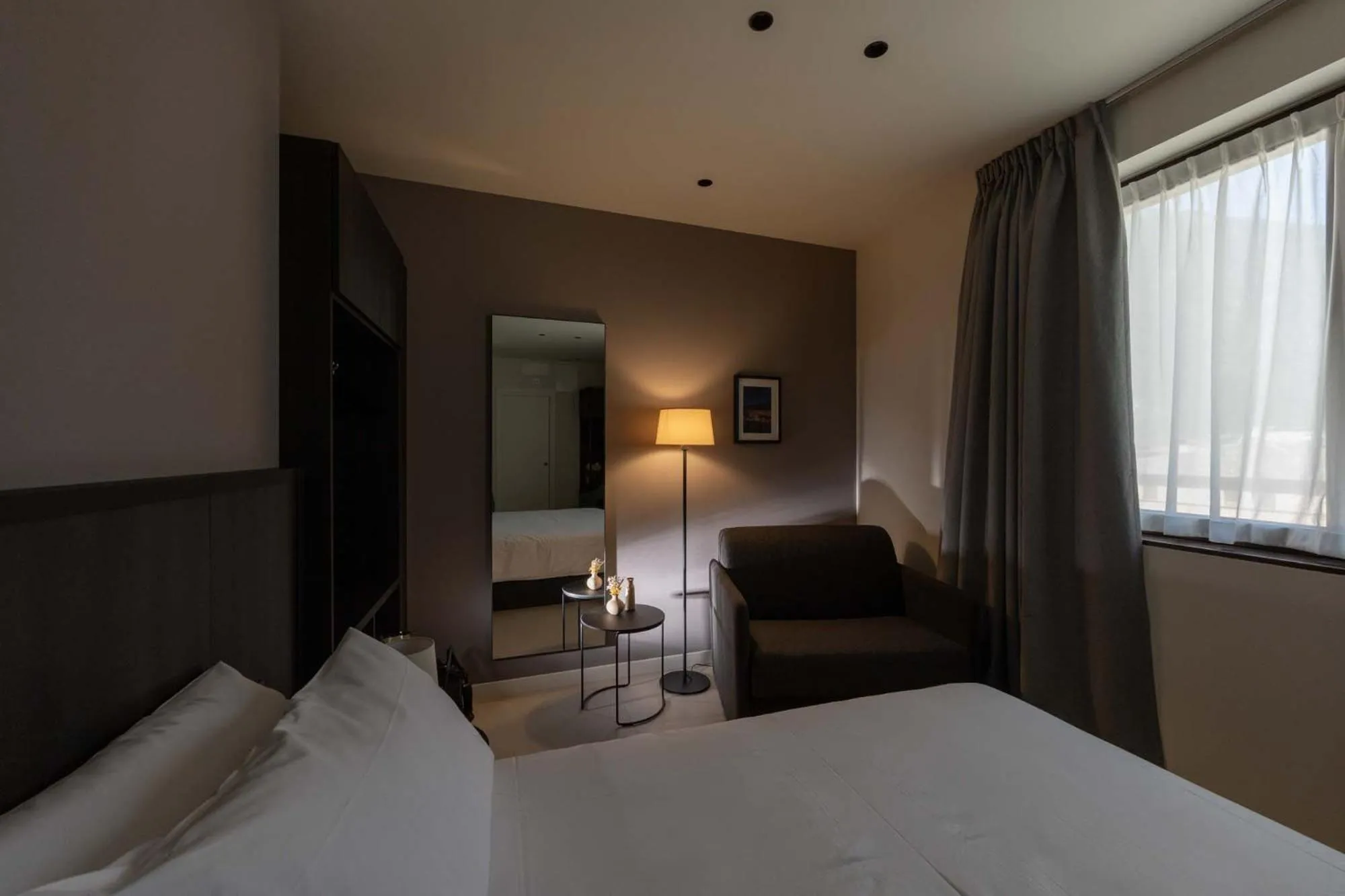 Bed in Hotel Stelvio Tirano