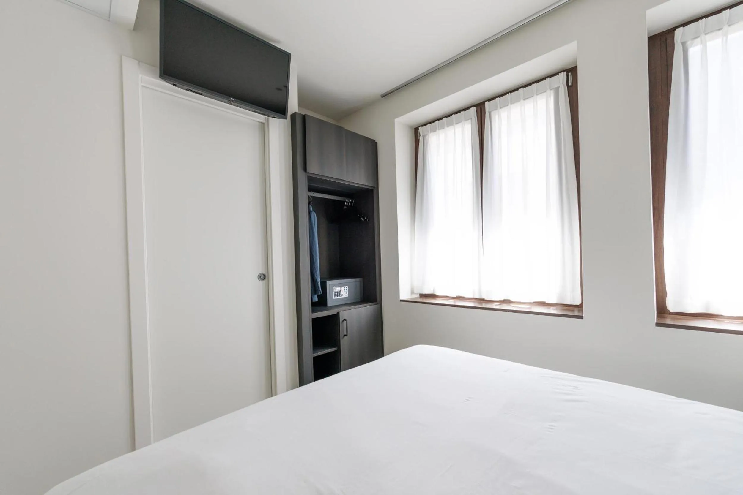 Bed in Hotel Stelvio Tirano