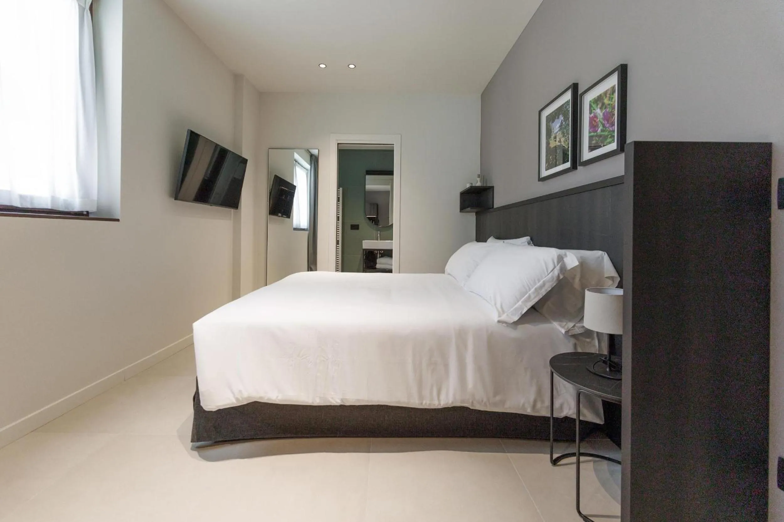 Bed in Hotel Stelvio Tirano