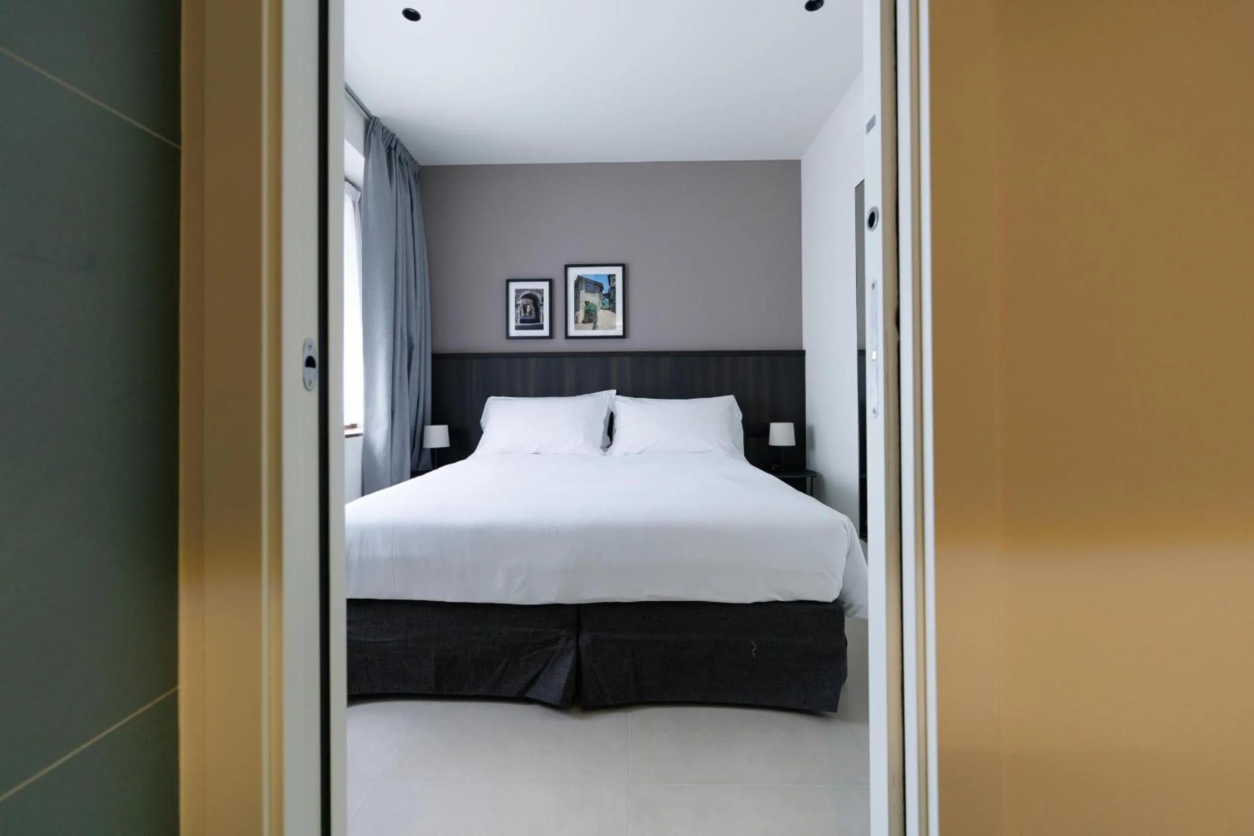 Bed in Hotel Stelvio Tirano