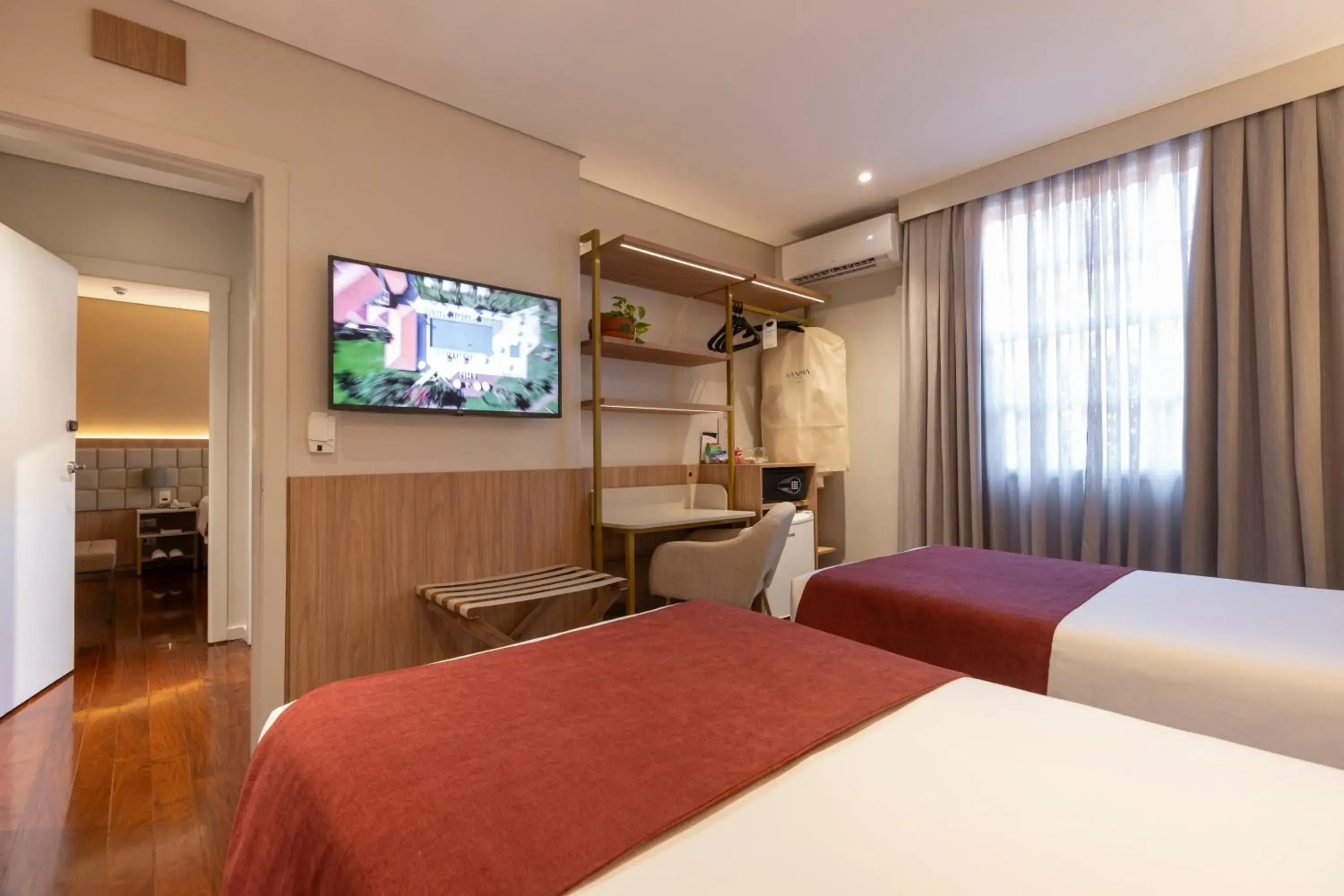 Photo of the whole room, Bed in Sanma Hotel Photo of the whole room, Bed in Sanma Hotel