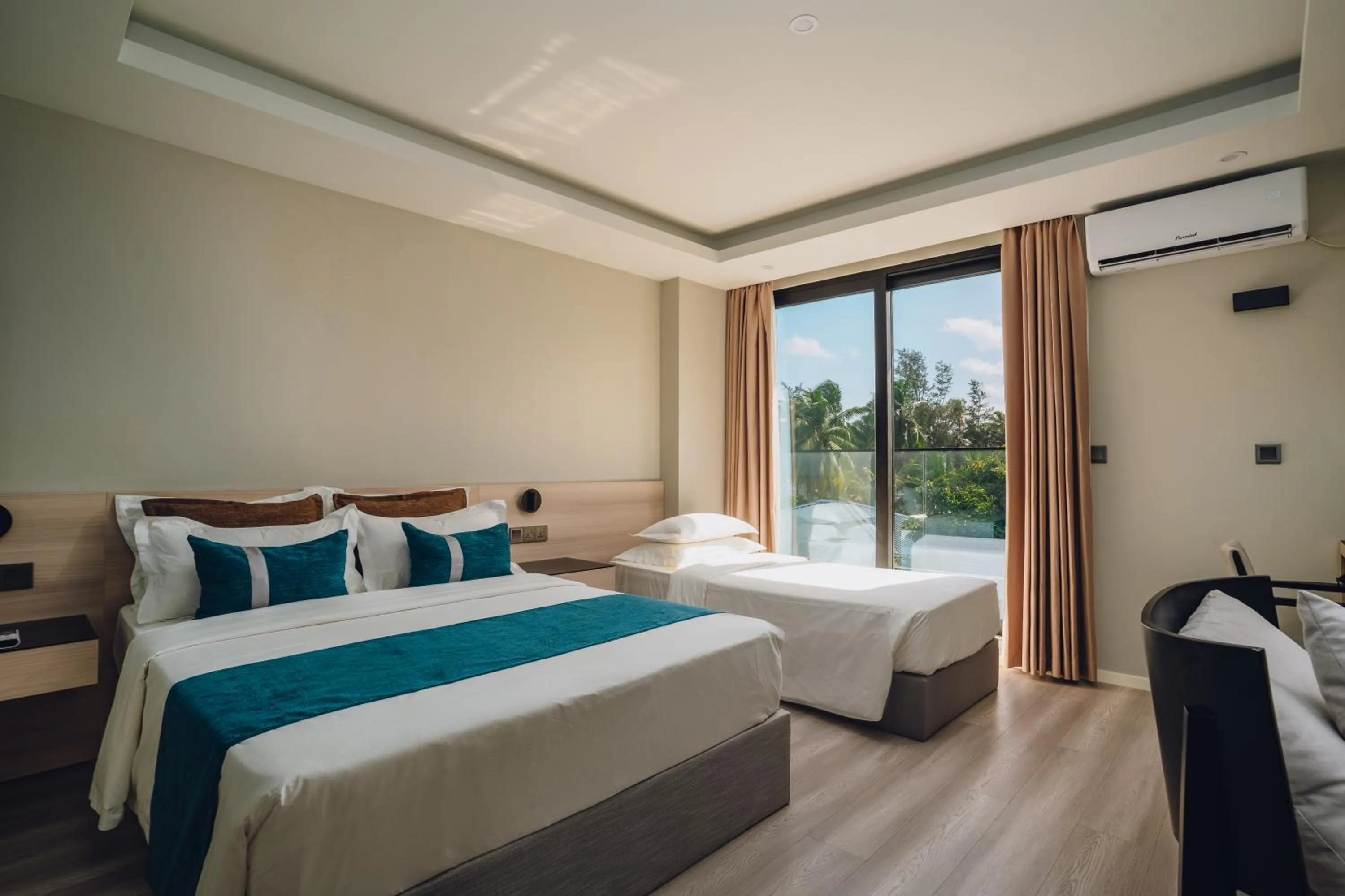 Bed in Ocean Pearl Family Suite