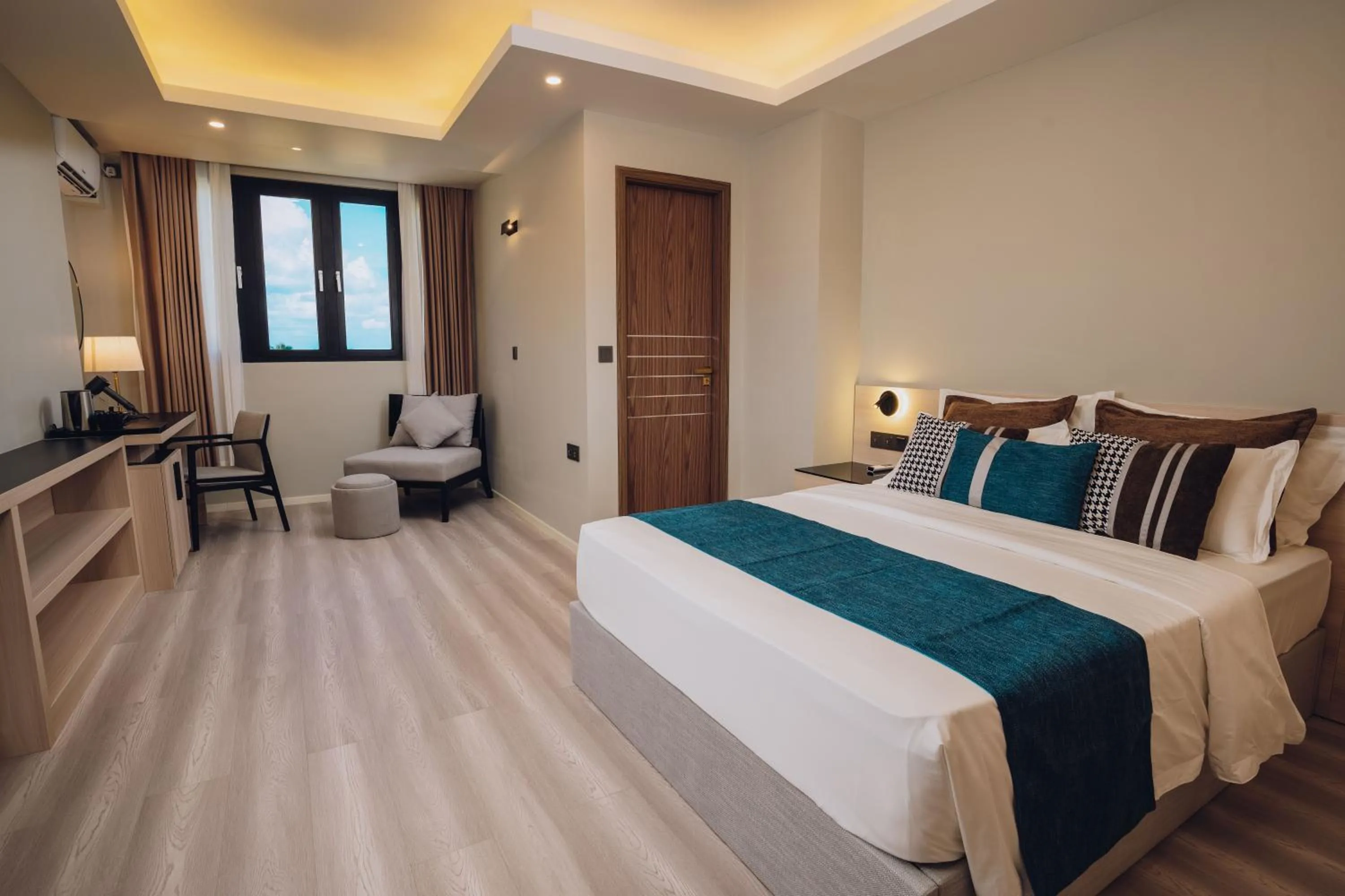 Bed in Ocean Pearl Family Suite