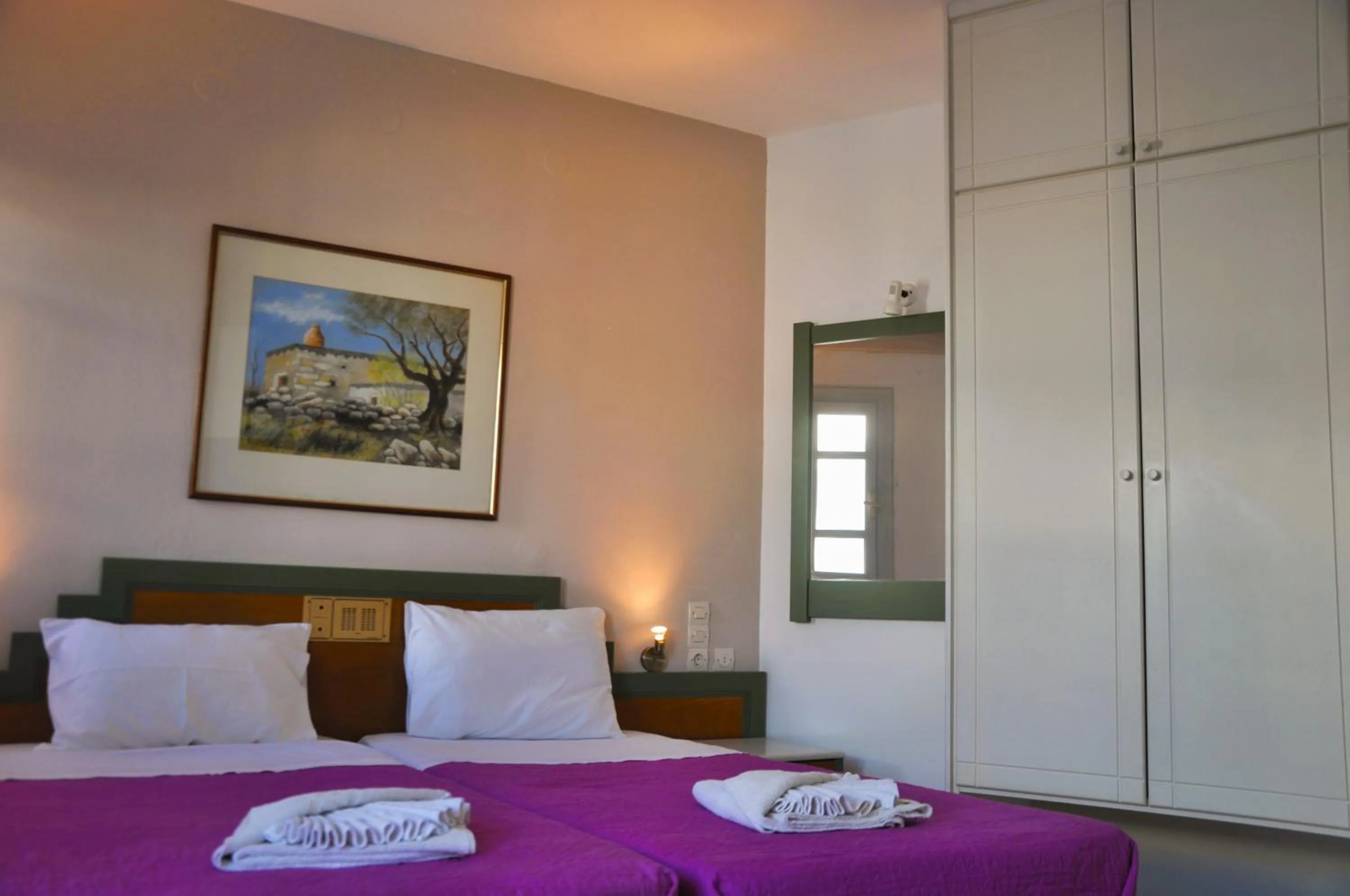Bed in Helen Suites