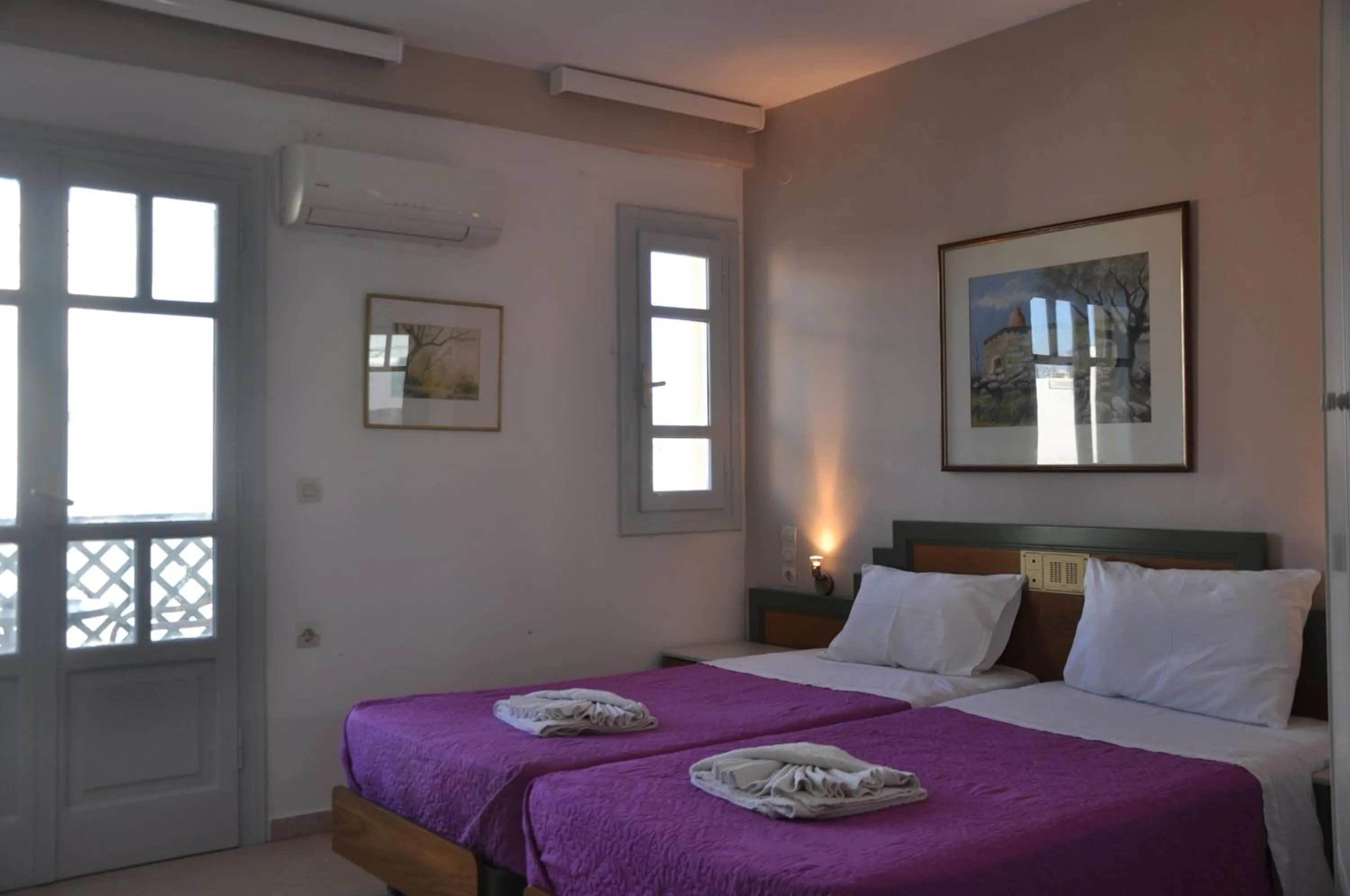 Bed in Helen Suites