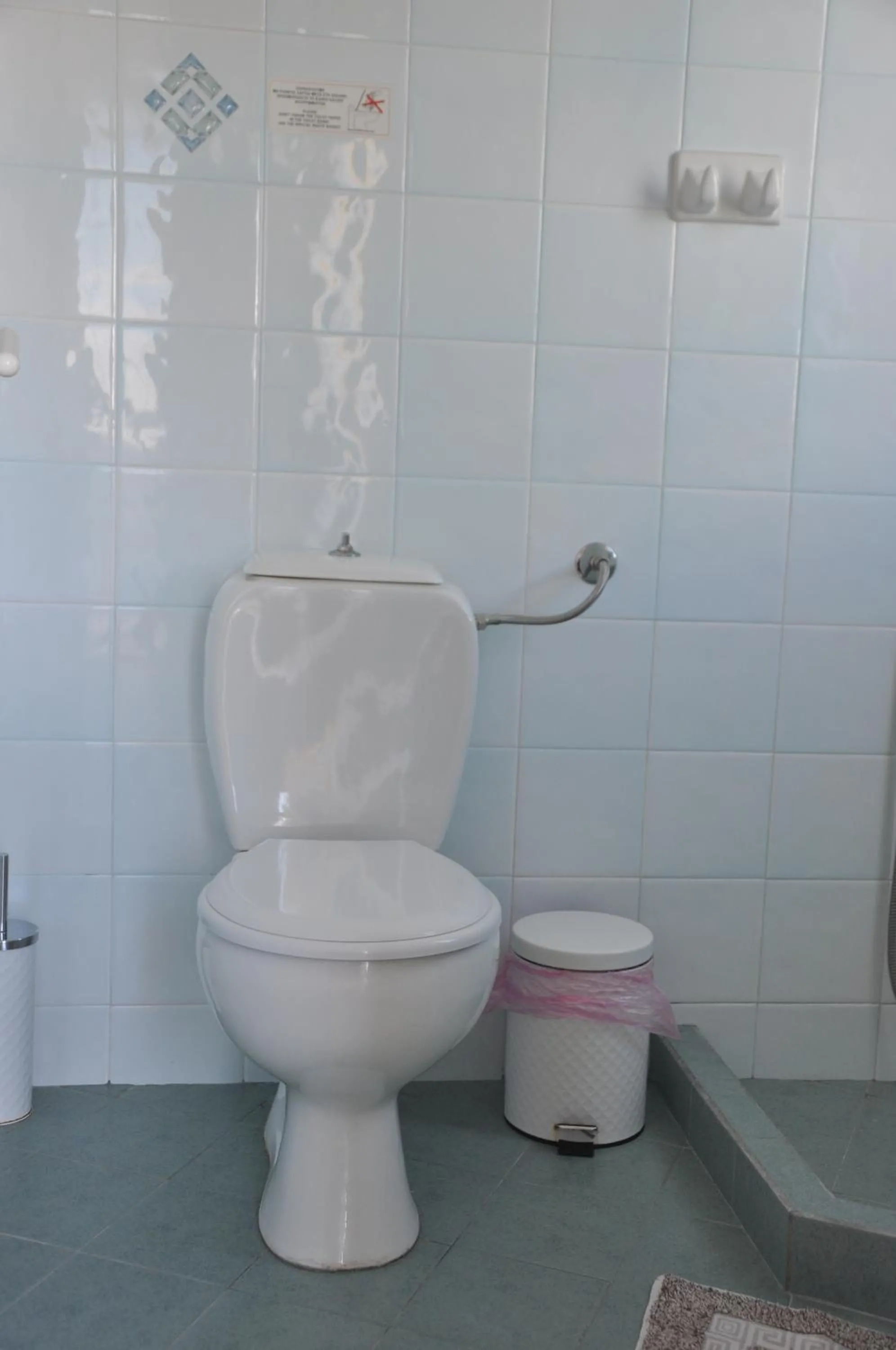 Toilet in Helen Suites