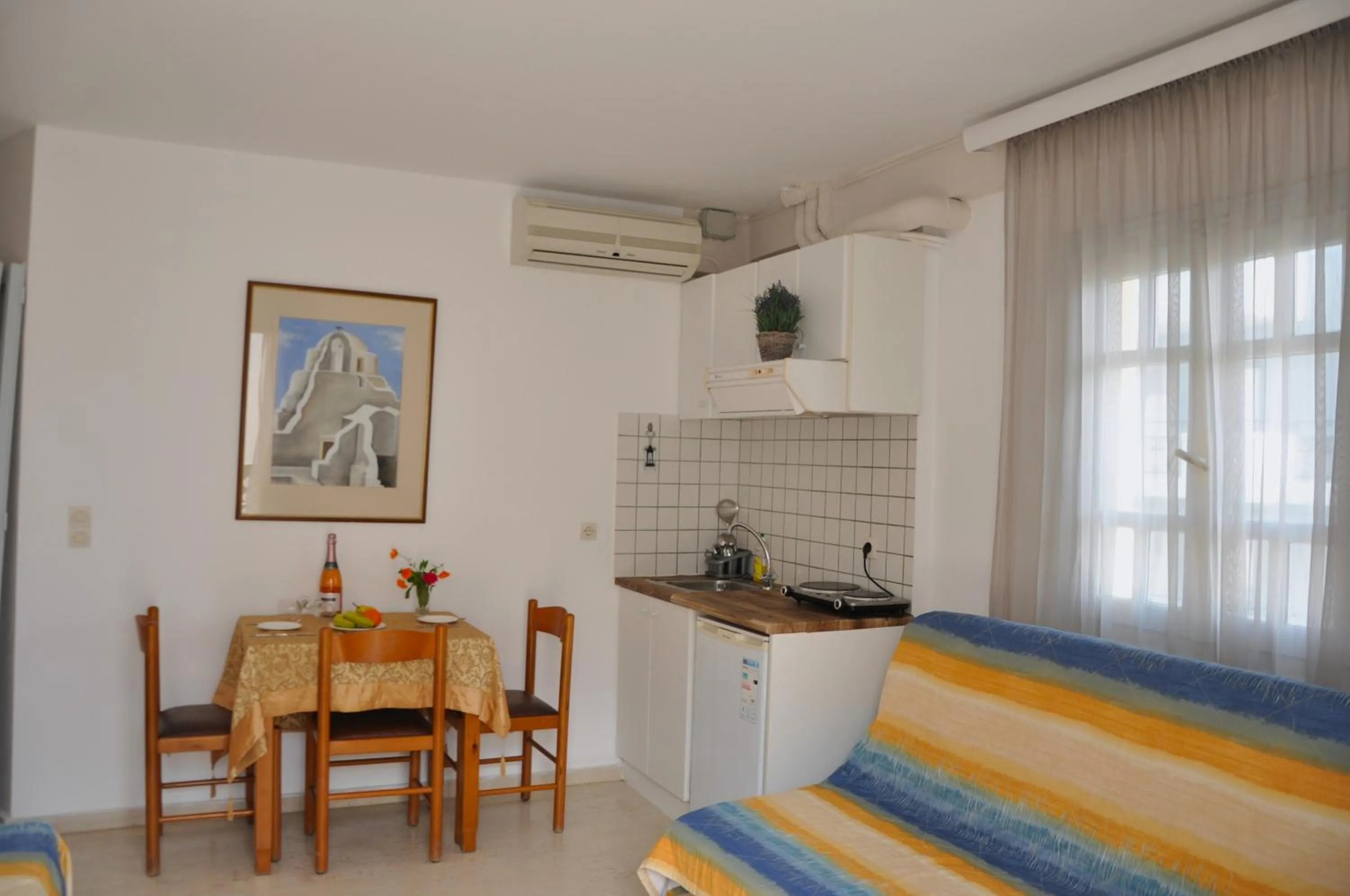 Kitchen or kitchenette in Helen Suites