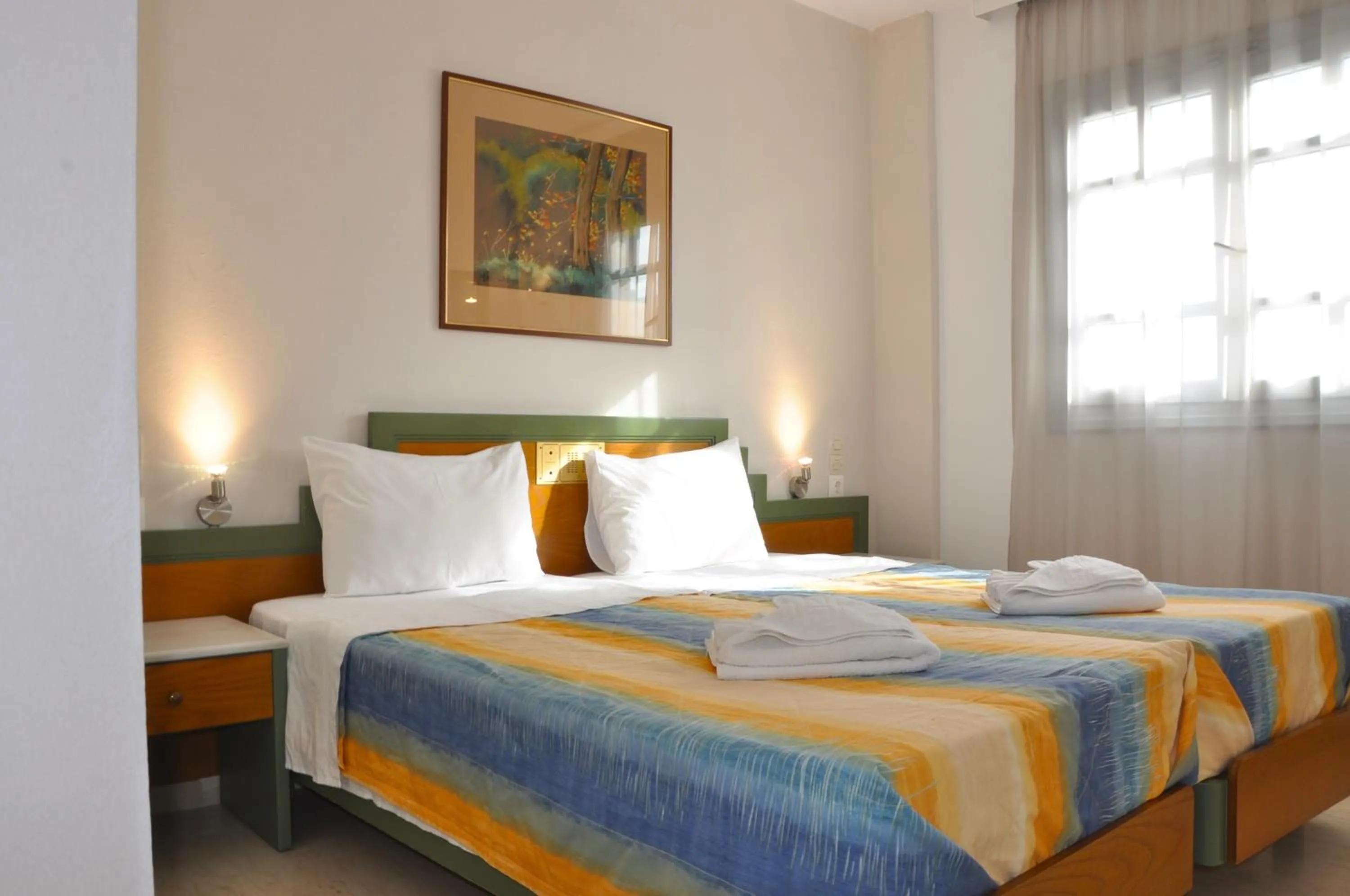 Bed in Helen Suites