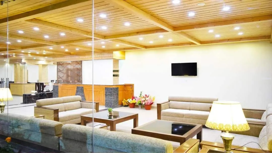 Communal lounge/ TV room in Azure Chandertal Regency Hotel And Spa