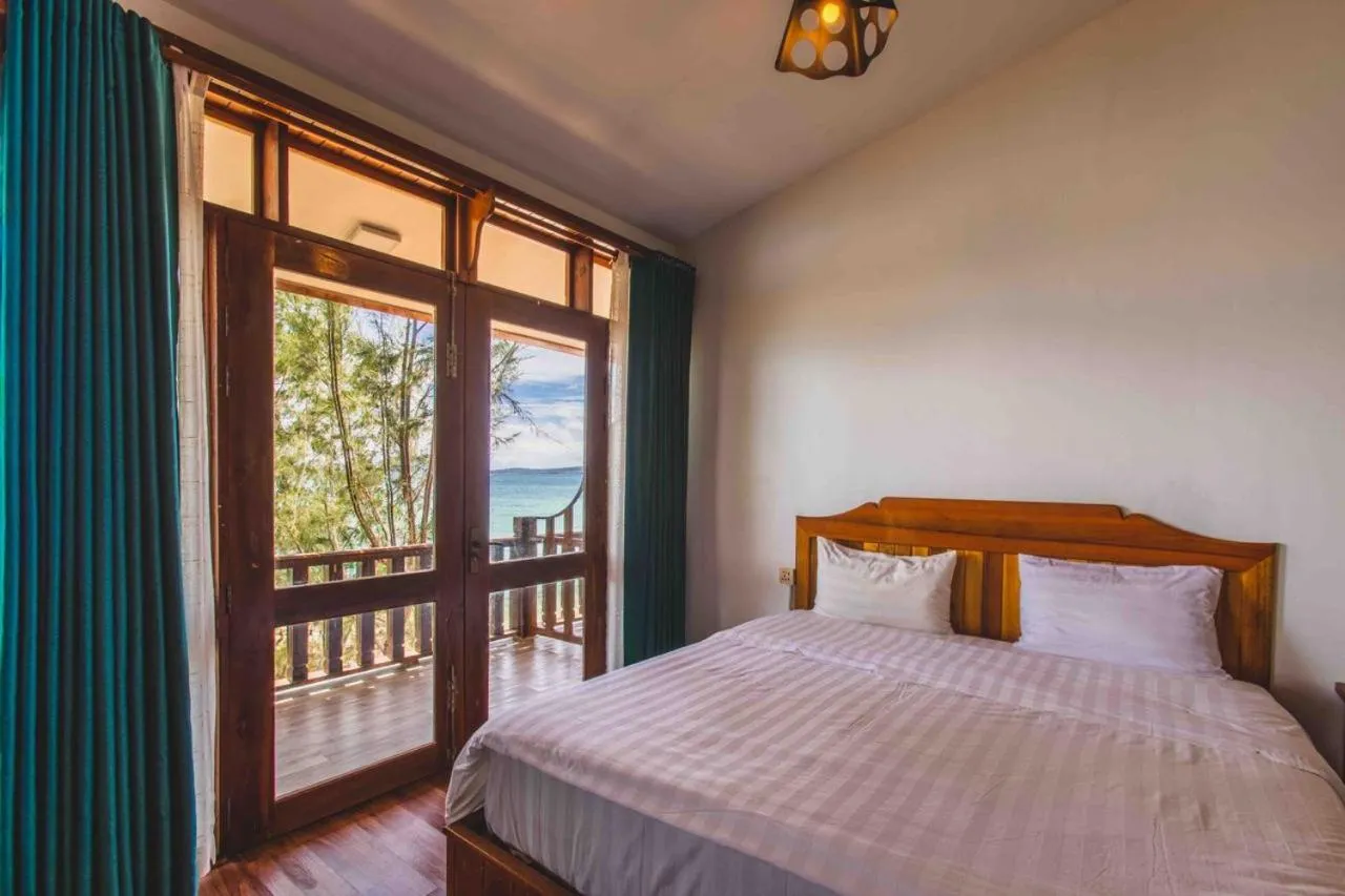 Bed in Tree House Bungalows