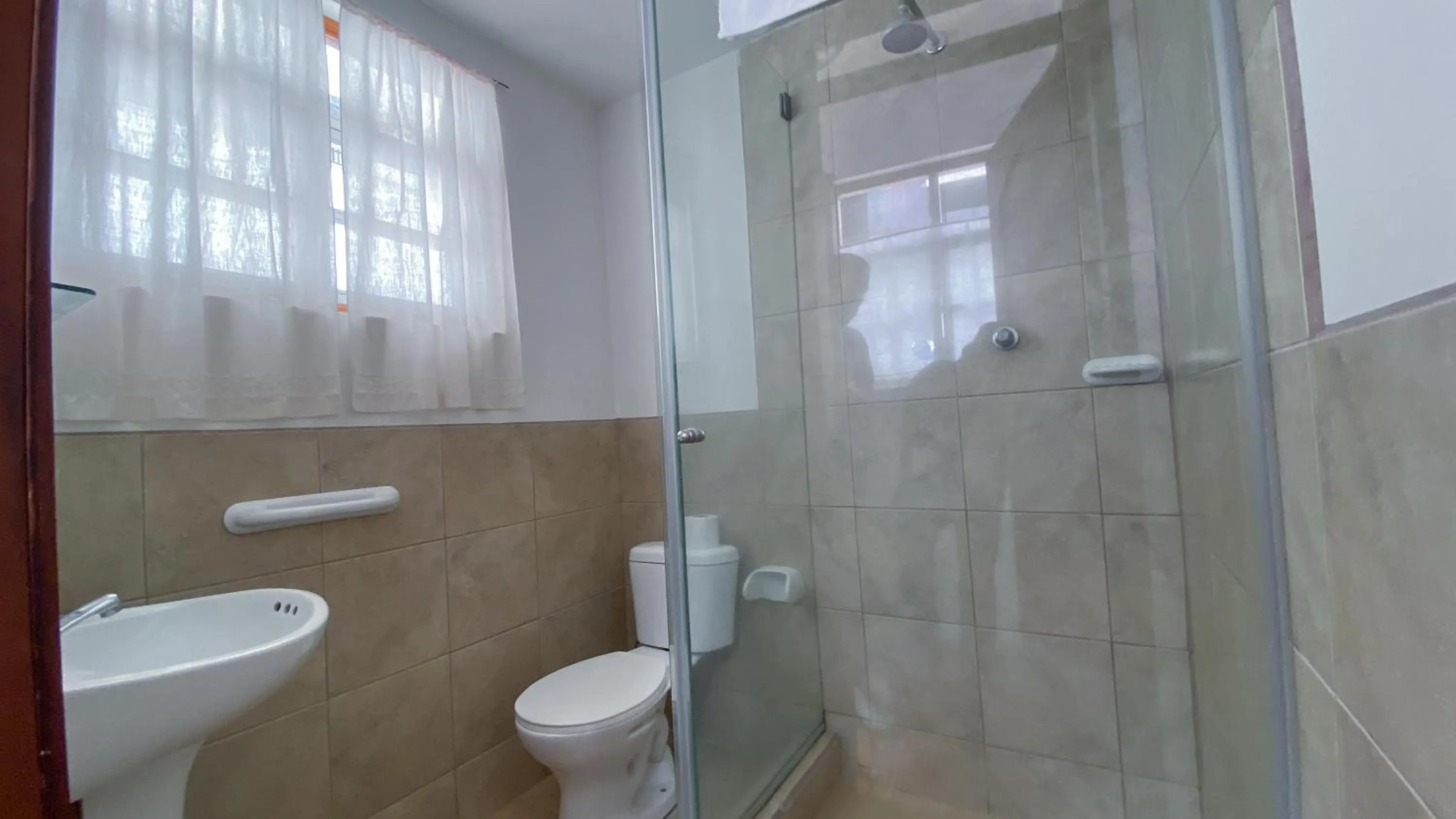 Bathroom in Sakti Hostal B&B