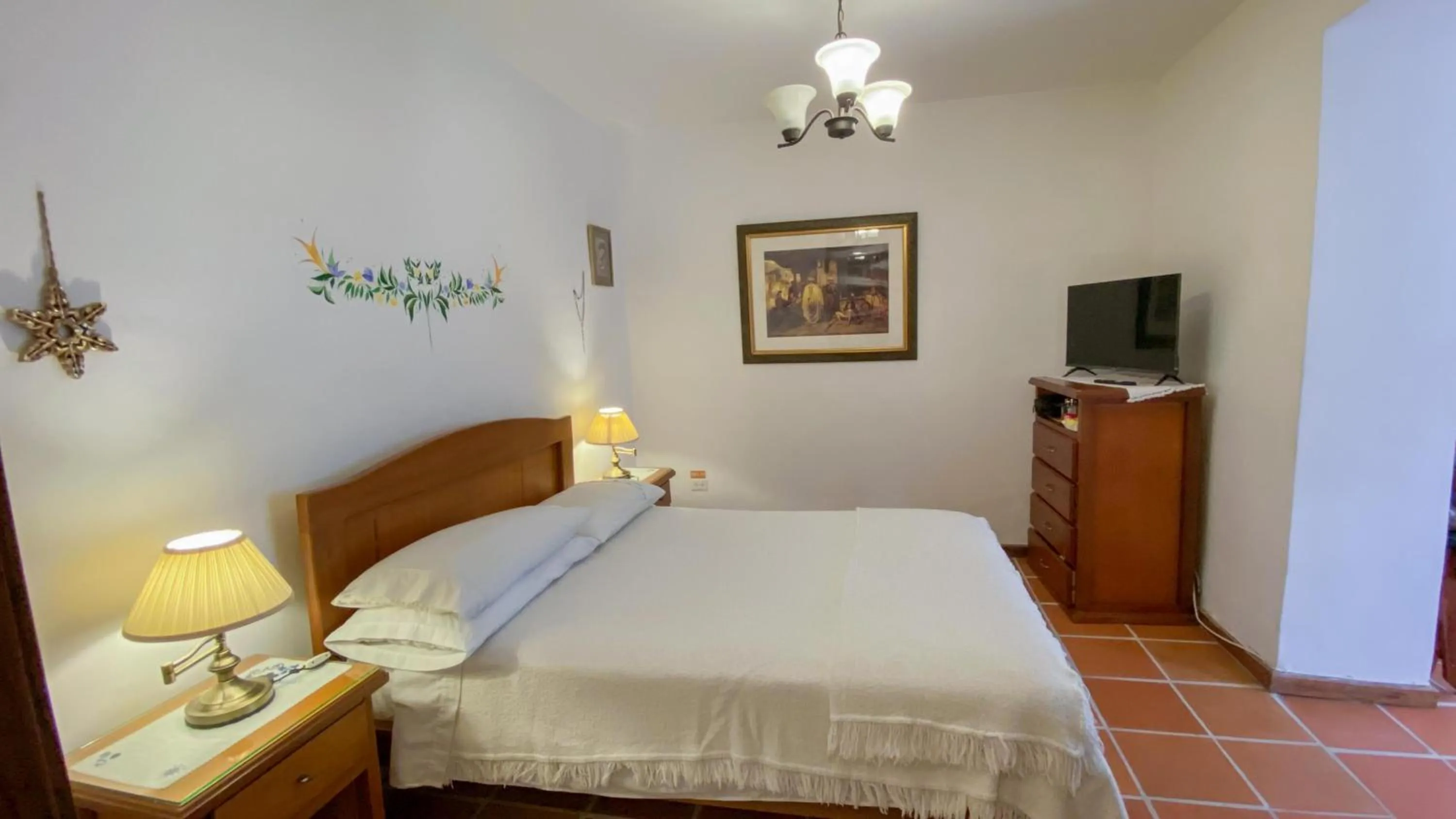 Bed in Sakti Hostal B&B