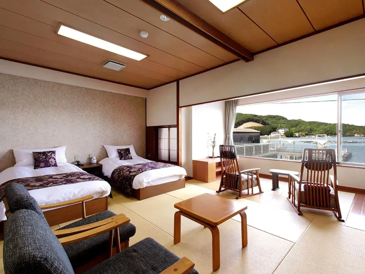 Twin Room with Tatami Area and Hot Spring Bath in Sun Urashima Yuki no Sato Twin Room with Tatami Area and Hot Spring Bath in Sun Urashima Yuki no Sato