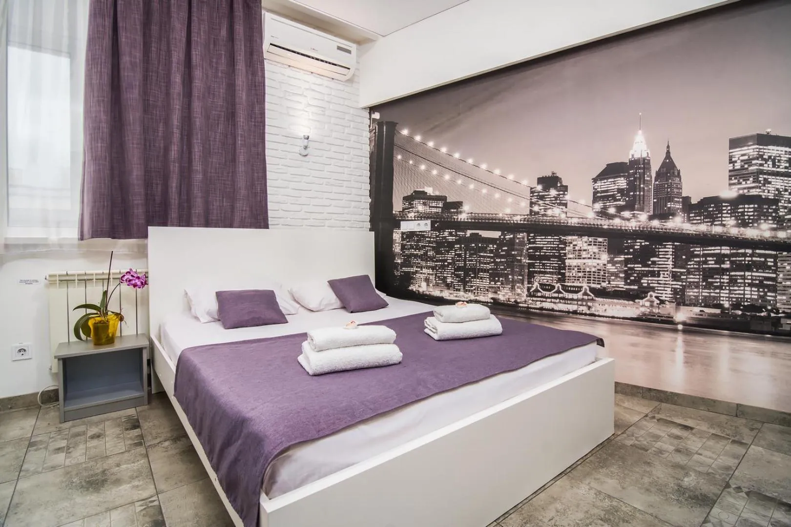Bed in SkyHome Mini-hotel