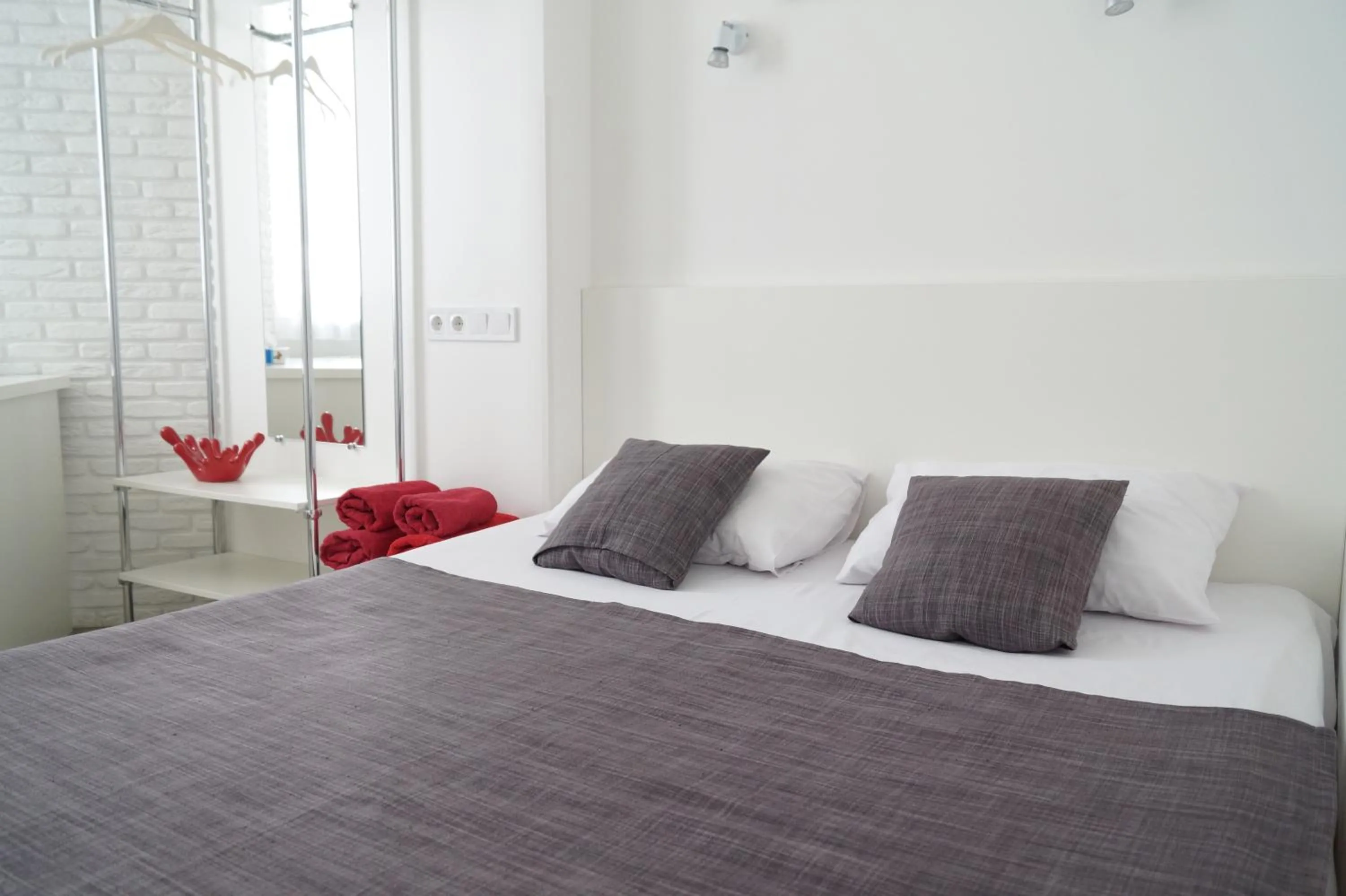 Bed in SkyHome Mini-hotel