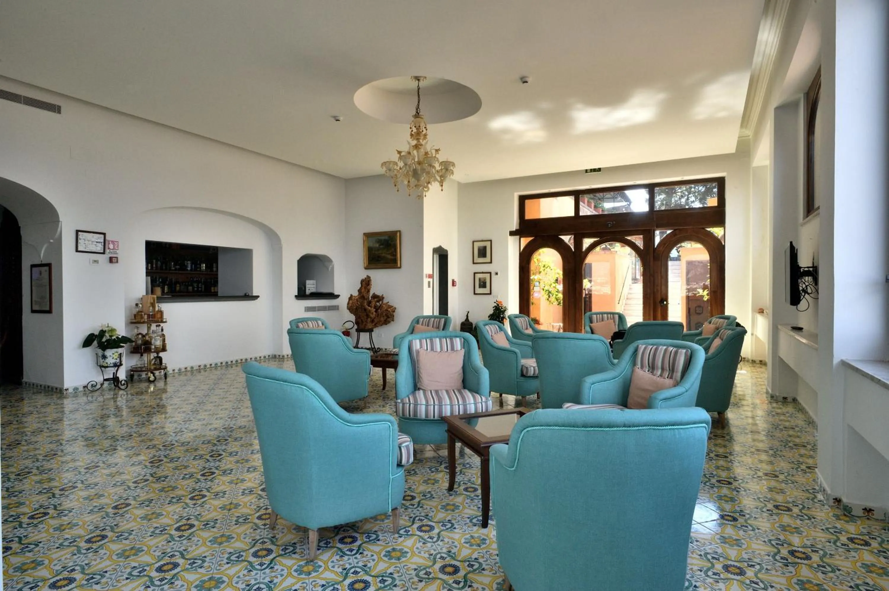 Communal lounge/ TV room in Hotel La Tonnarella