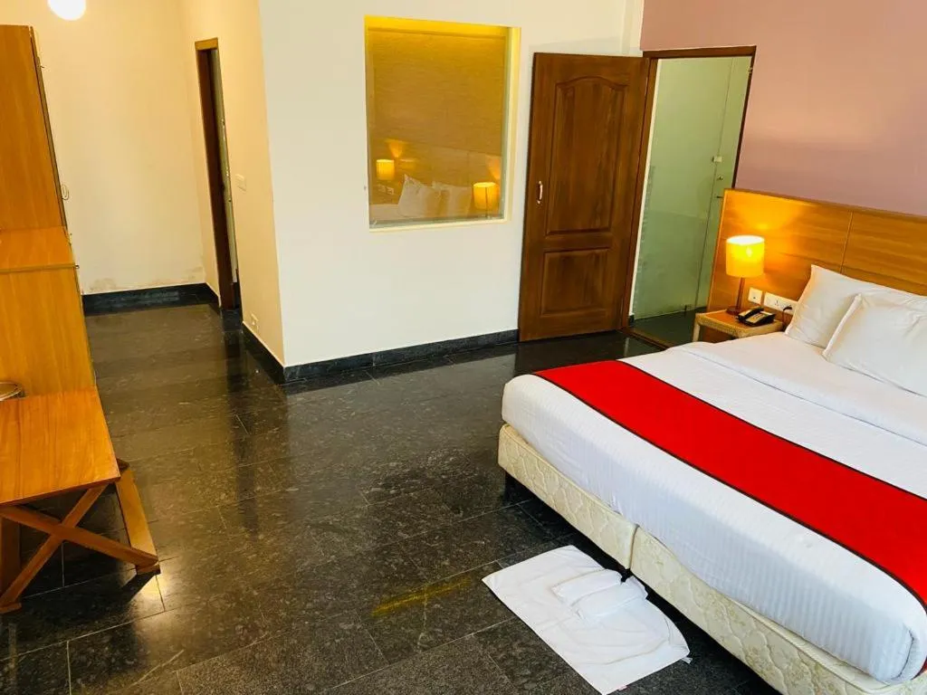 Bed in Peppervine Hotel