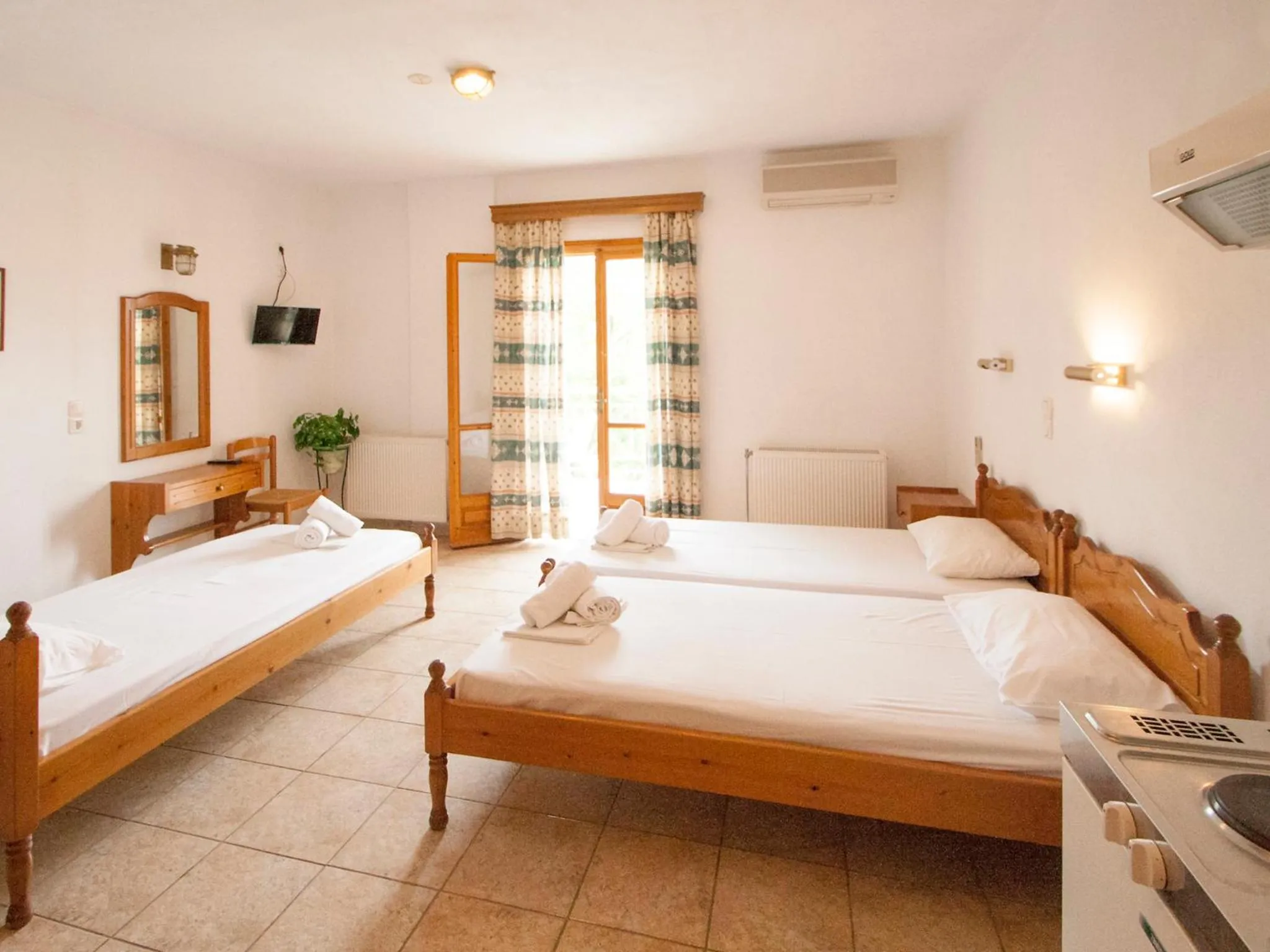 Seating area, Bed in LAURA Skiathos