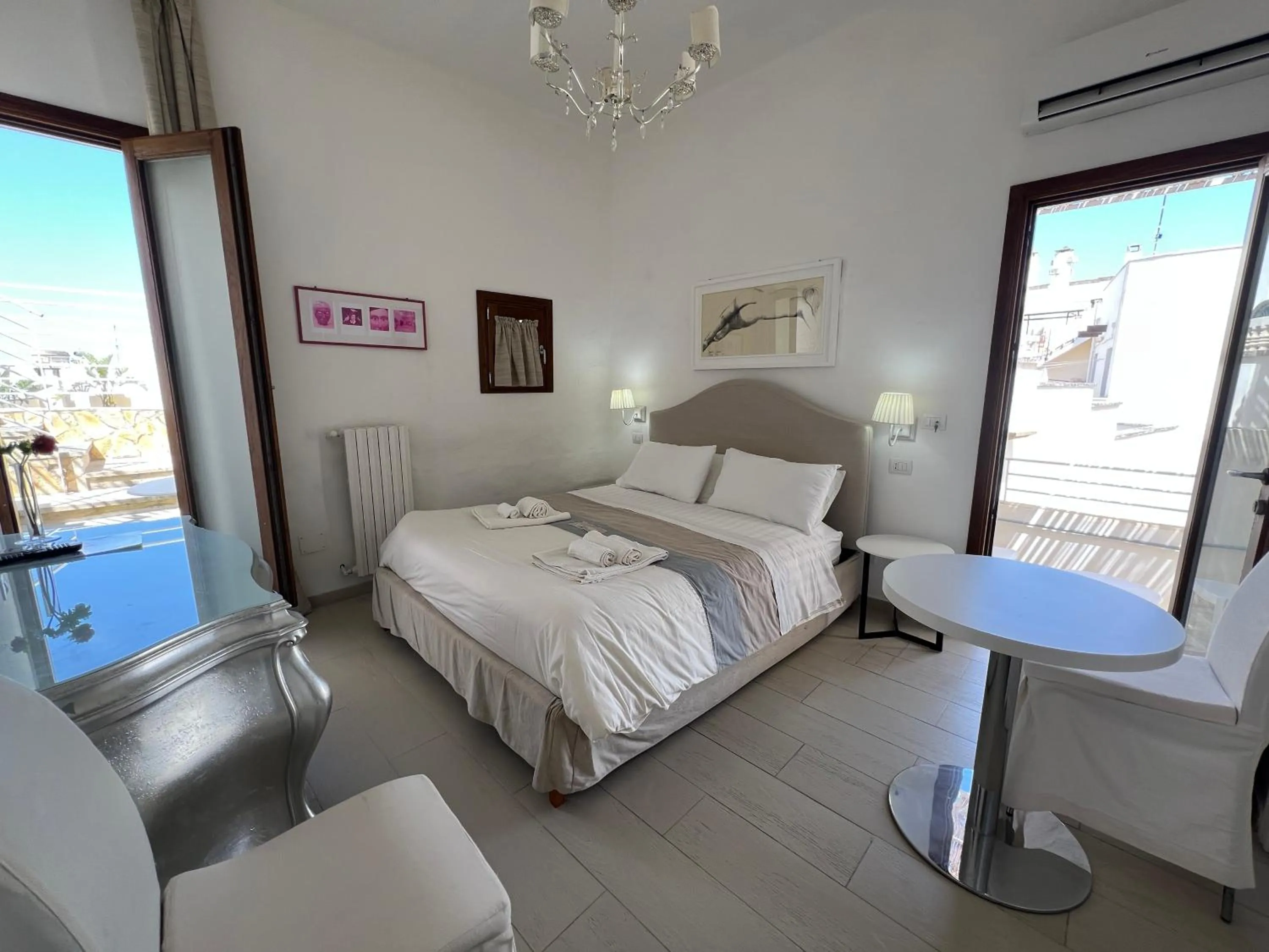 Bed in Elamar Rooms & Apartment