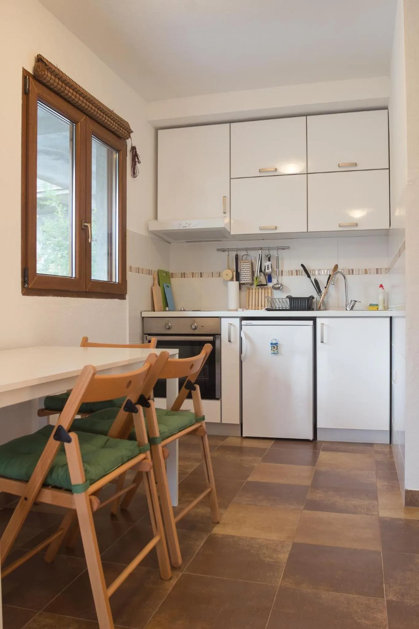 Kitchen or kitchenette in Olive Apartment