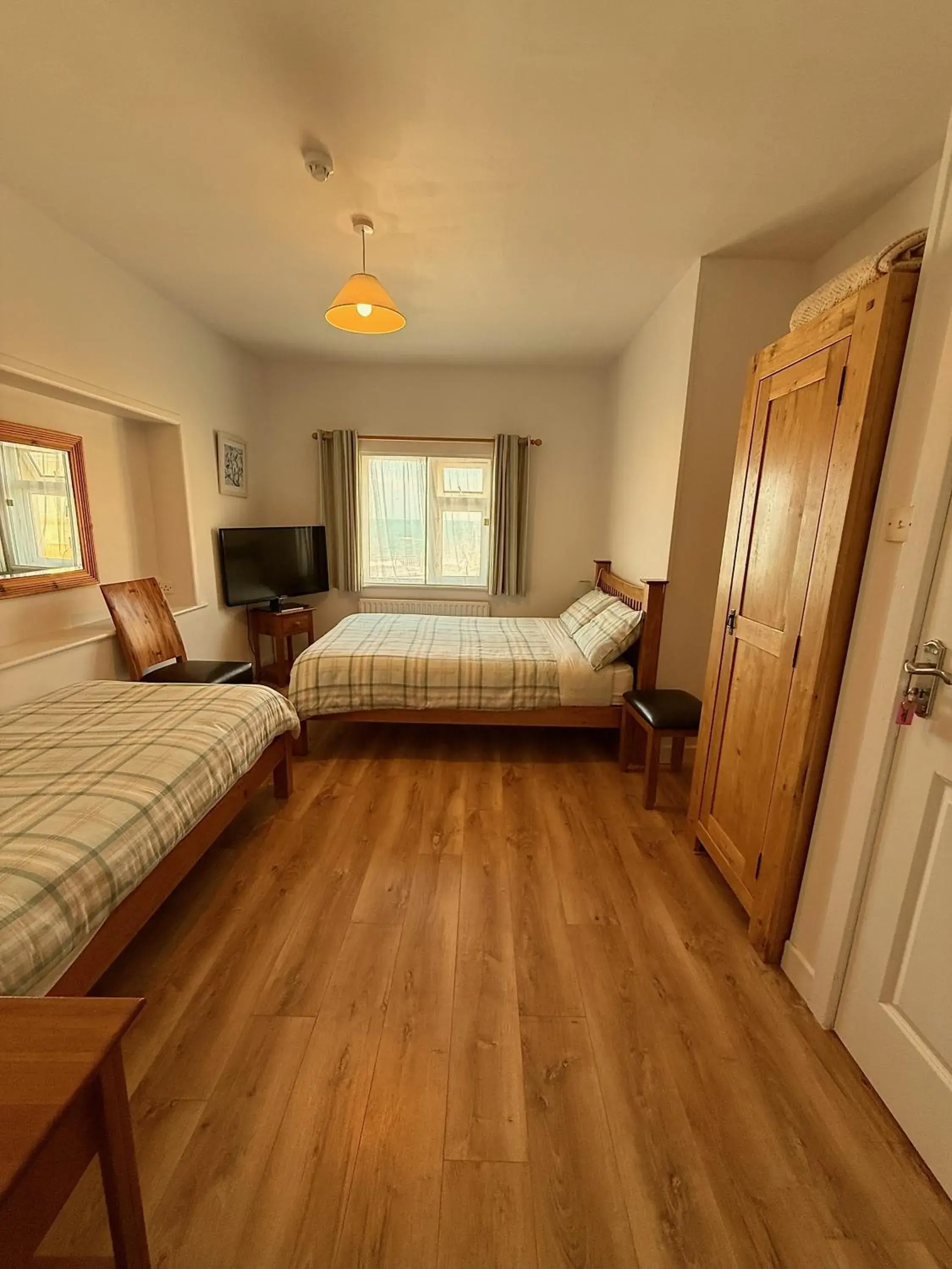 Family Room with Side Sea View in O'Neill's Bed&Breakfast Family Room with Side Sea View in O'Neill's Bed&Breakfast