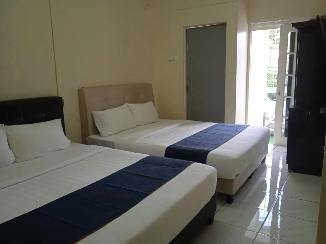 Bed in Cool view budget hotel