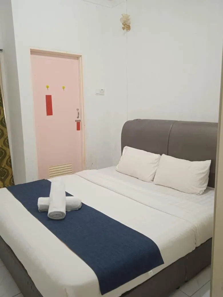 Bed in Cool view budget hotel